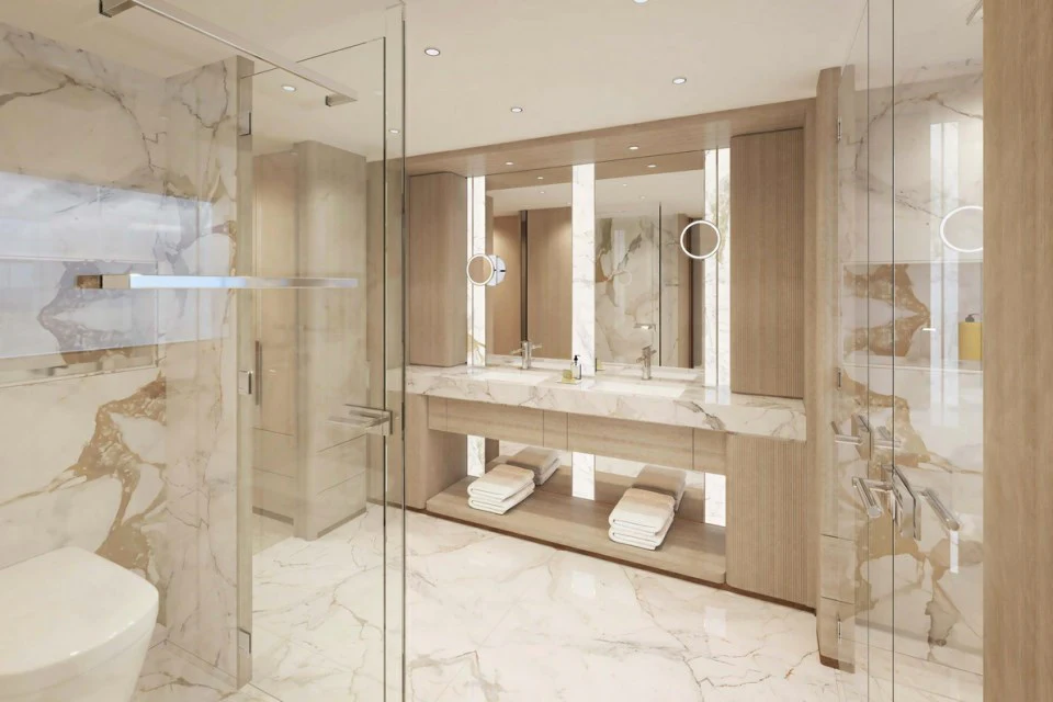 a bathroom with a glass shower aboard XWAVE Yacht for Charter