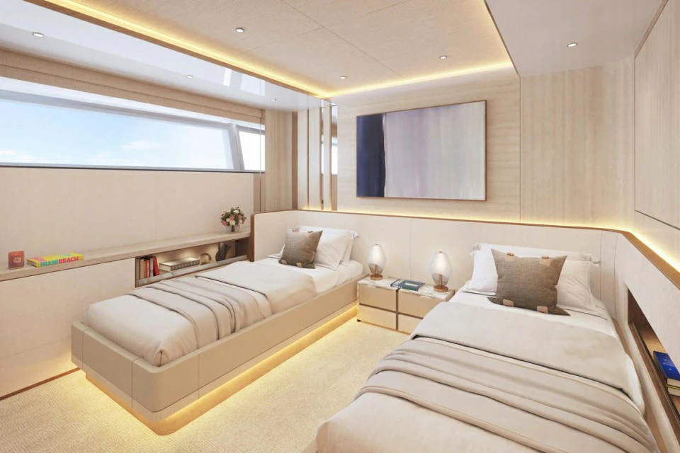 a room with two beds aboard XWAVE Yacht for Charter