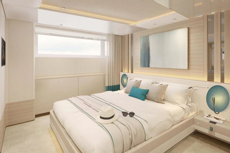a bed in a room aboard XWAVE Yacht for Charter