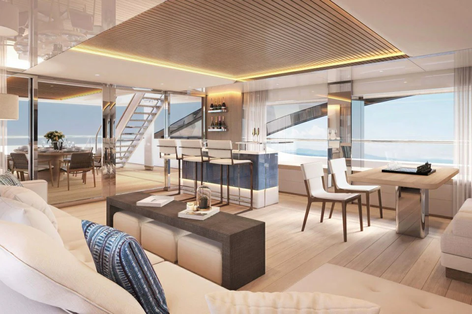 a room with a large window and a view of the ocean aboard XWAVE Yacht for Charter