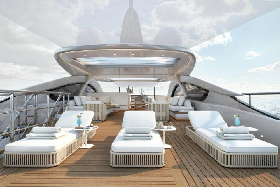 a deck with a view of a city and a large building aboard XWAVE Yacht for Charter