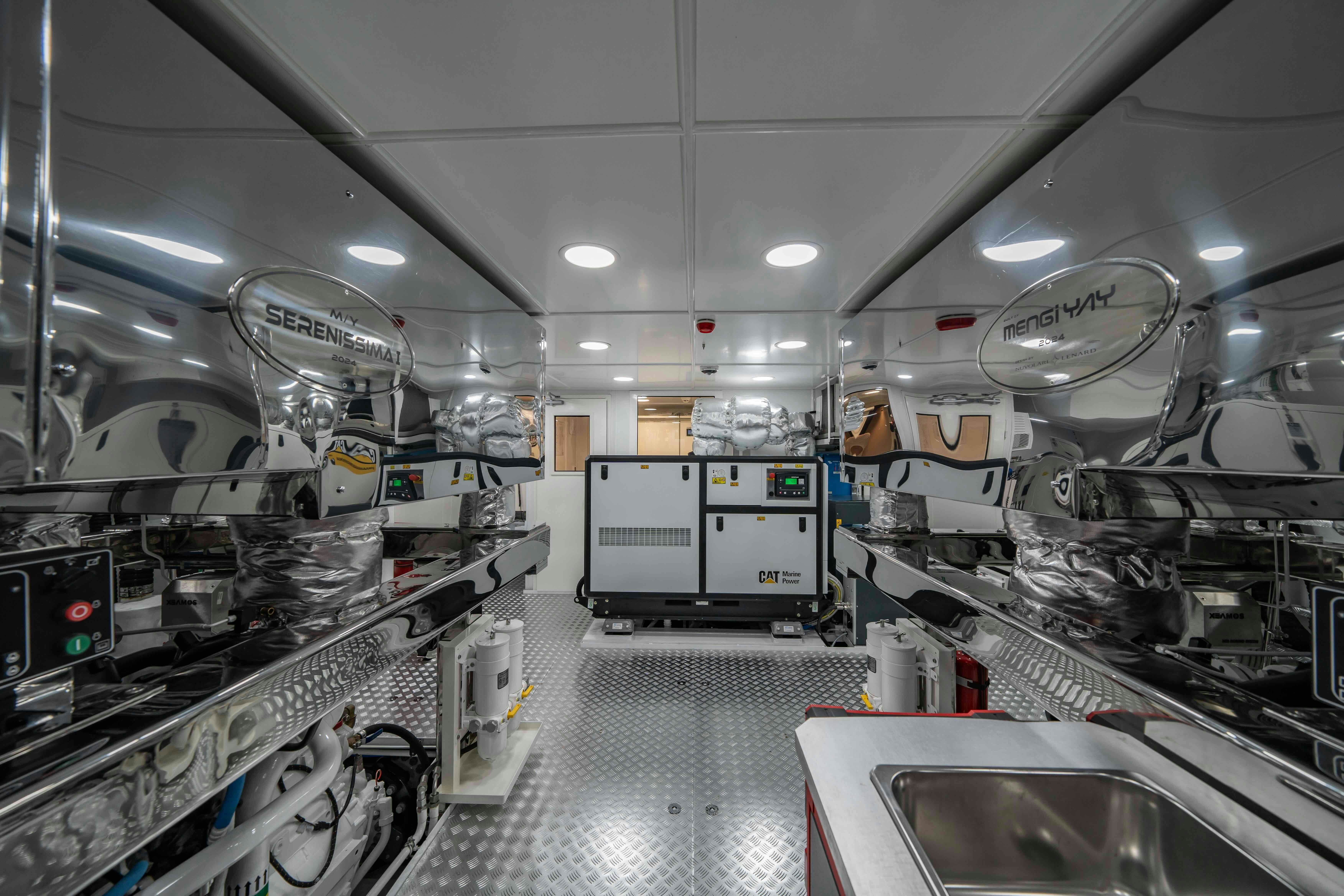 a room with machines and lights aboard SERENISSIMA I Yacht for Sale