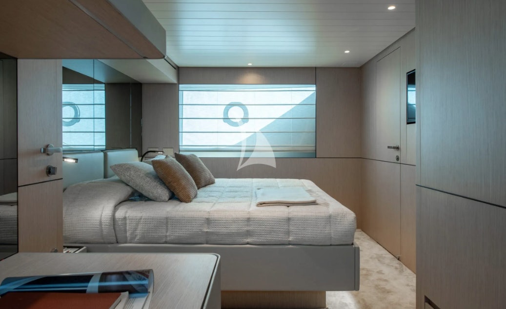 a bed in a room aboard CC Yacht for Charter
