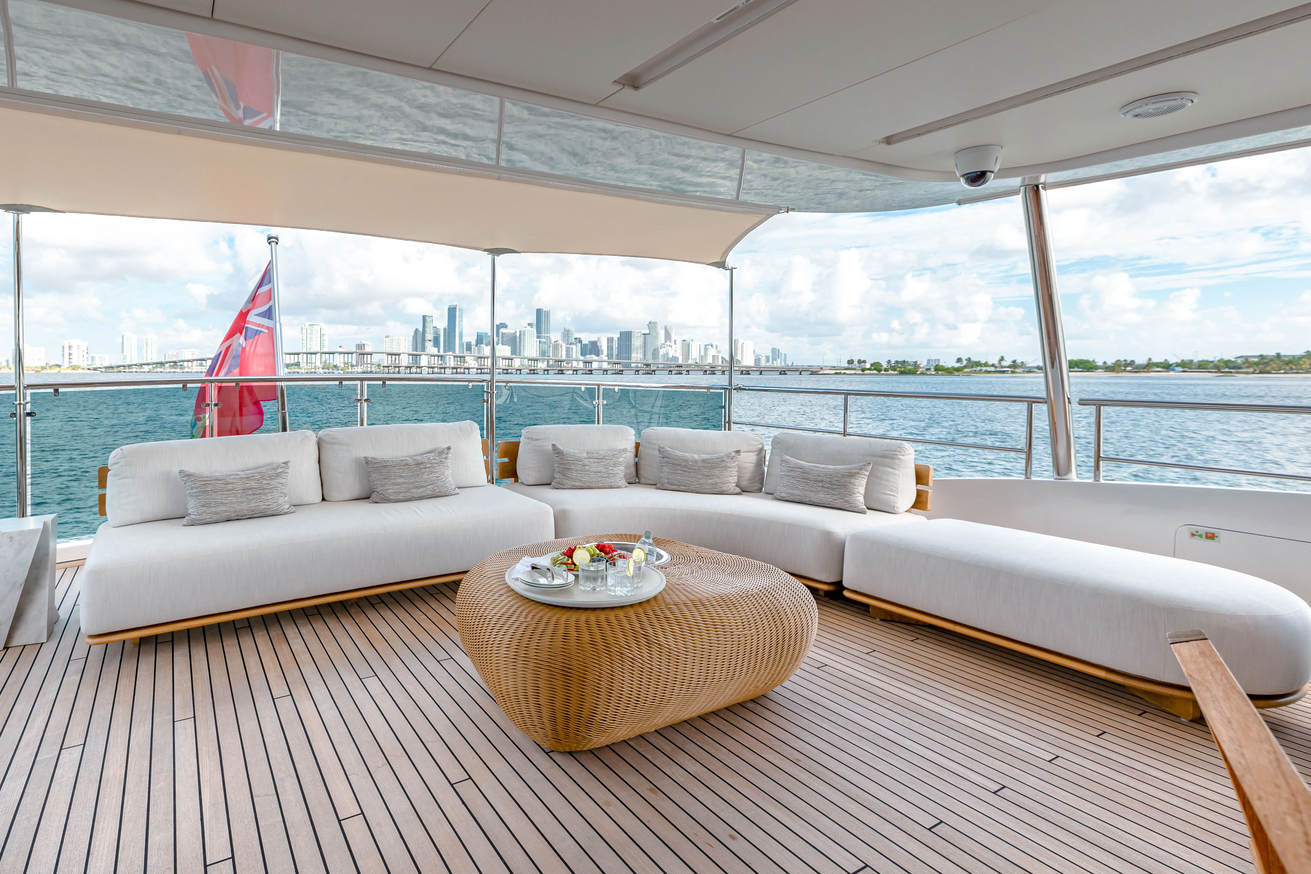 a living room with a large window aboard PATIENCE Yacht for Charter