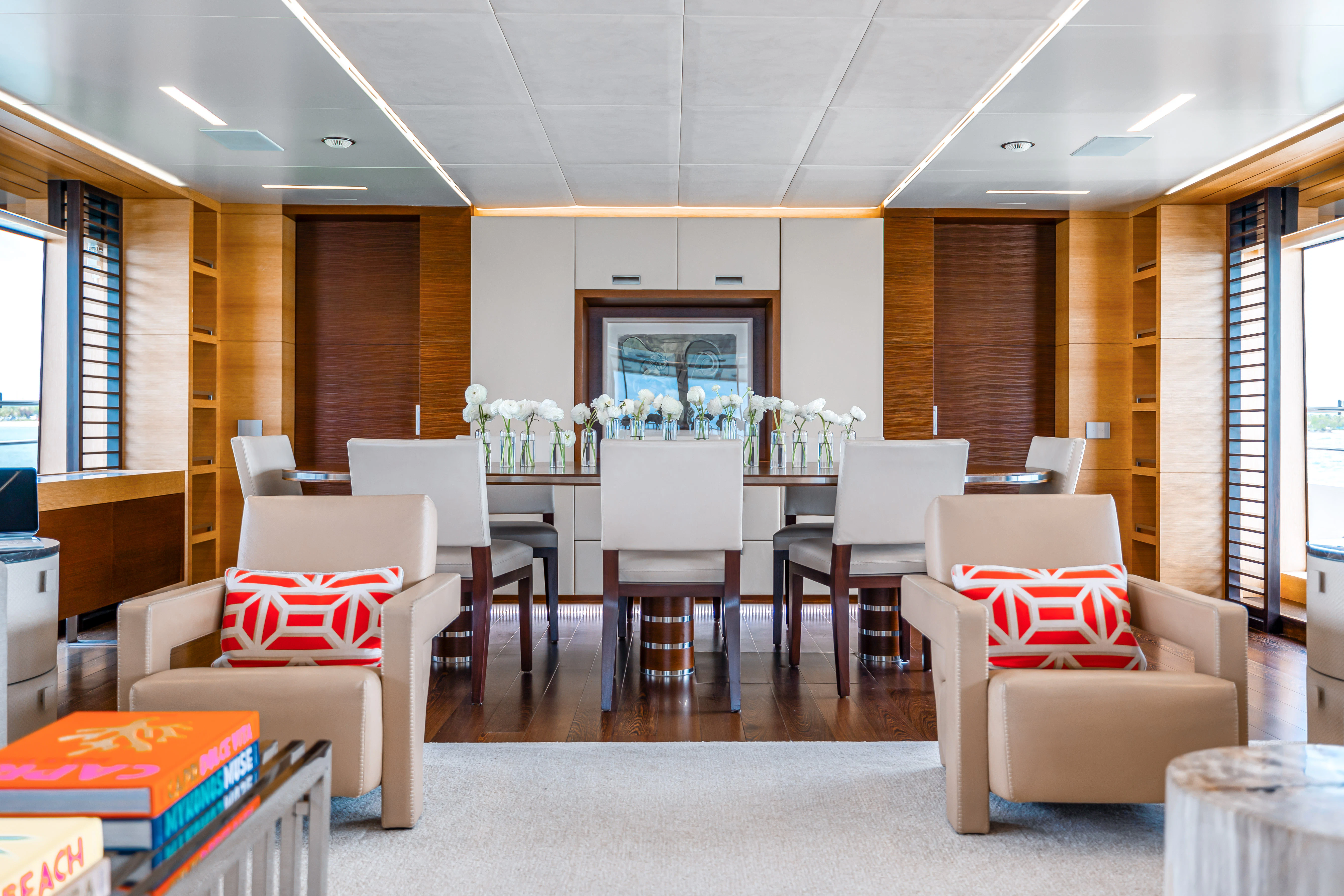 a room with chairs and tables aboard PATIENCE Yacht for Charter