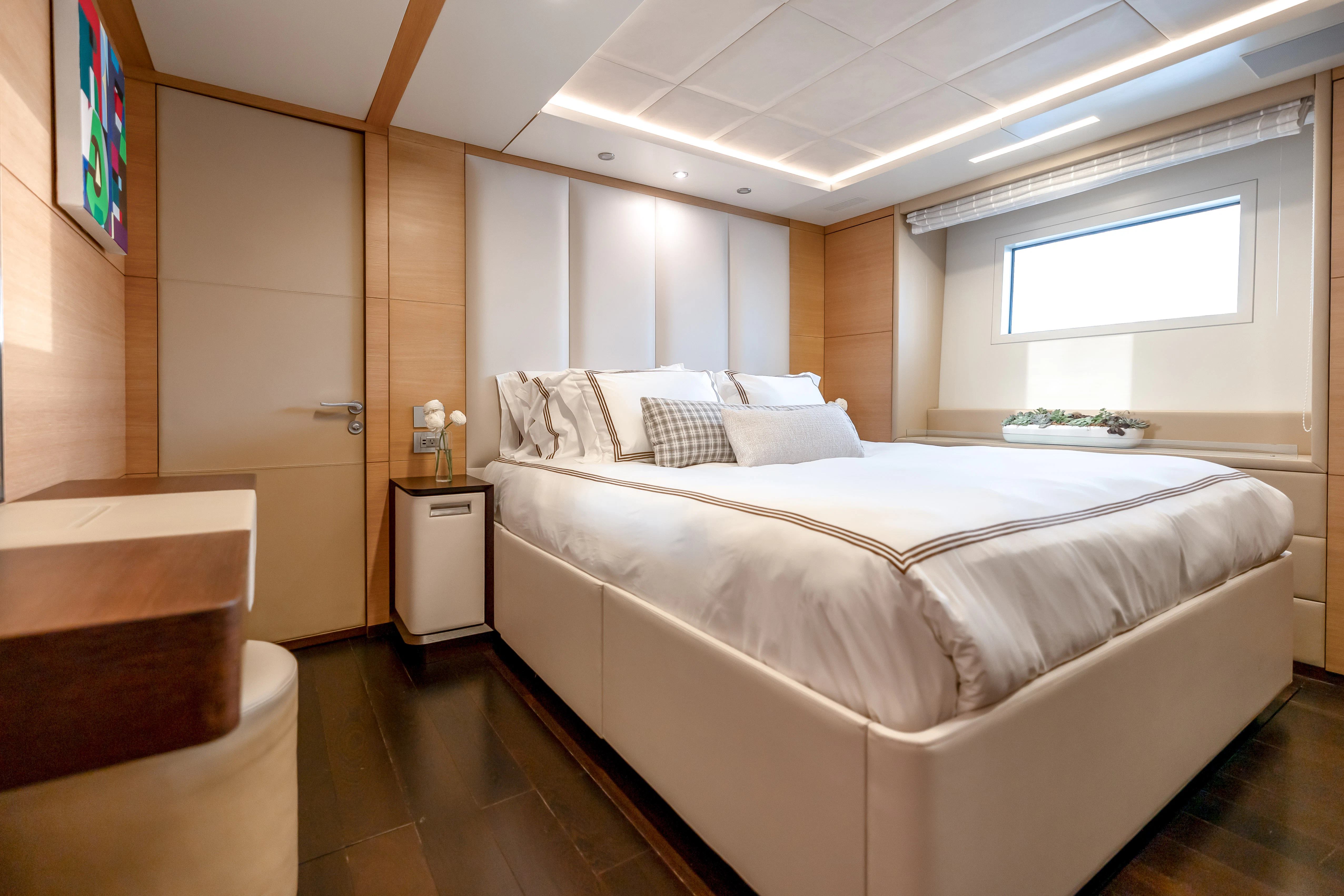 a large white bed in a room aboard PATIENCE Yacht for Charter