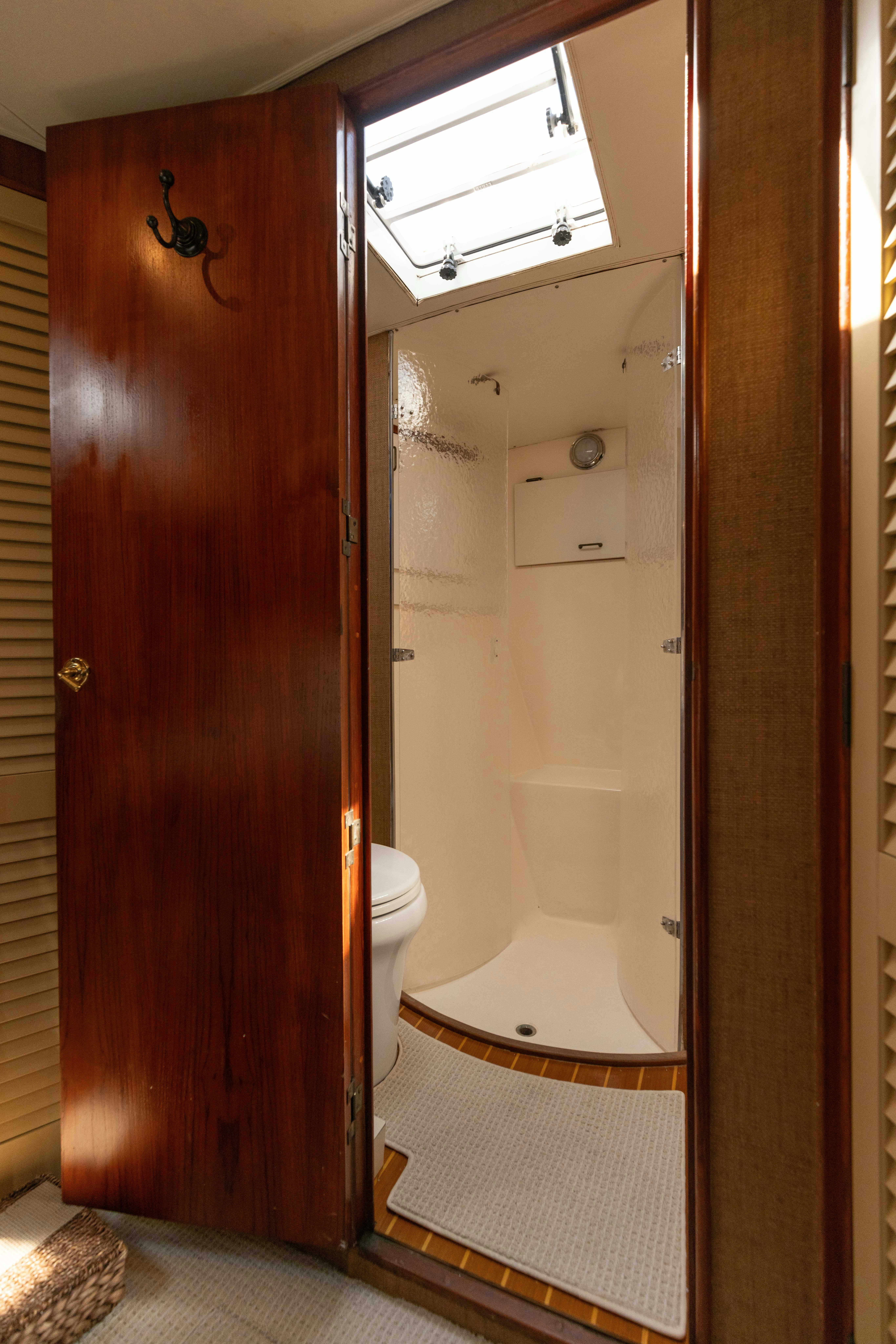 a bathroom with a shower aboard LUCKY MARLIN Yacht for Sale