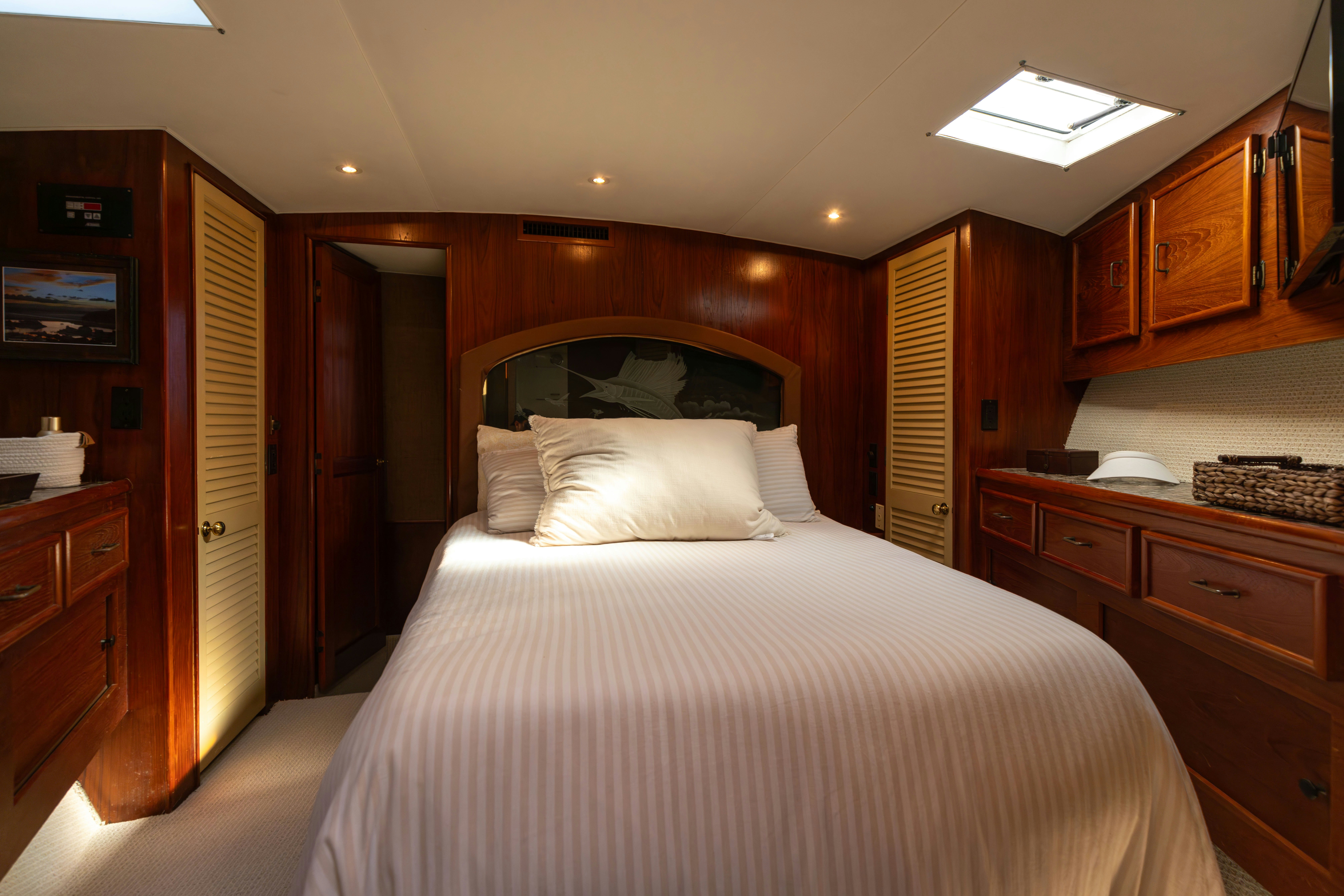 a bed in a room aboard LUCKY MARLIN Yacht for Sale