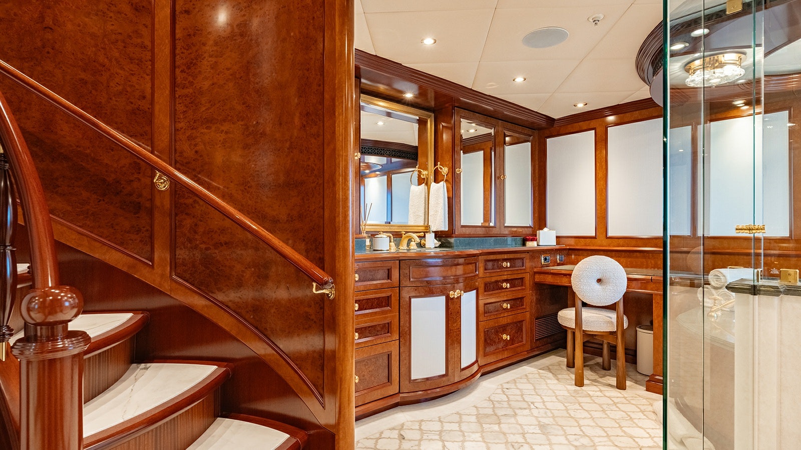 a bathroom with wooden cabinets aboard IRON BLONDE Yacht for Charter