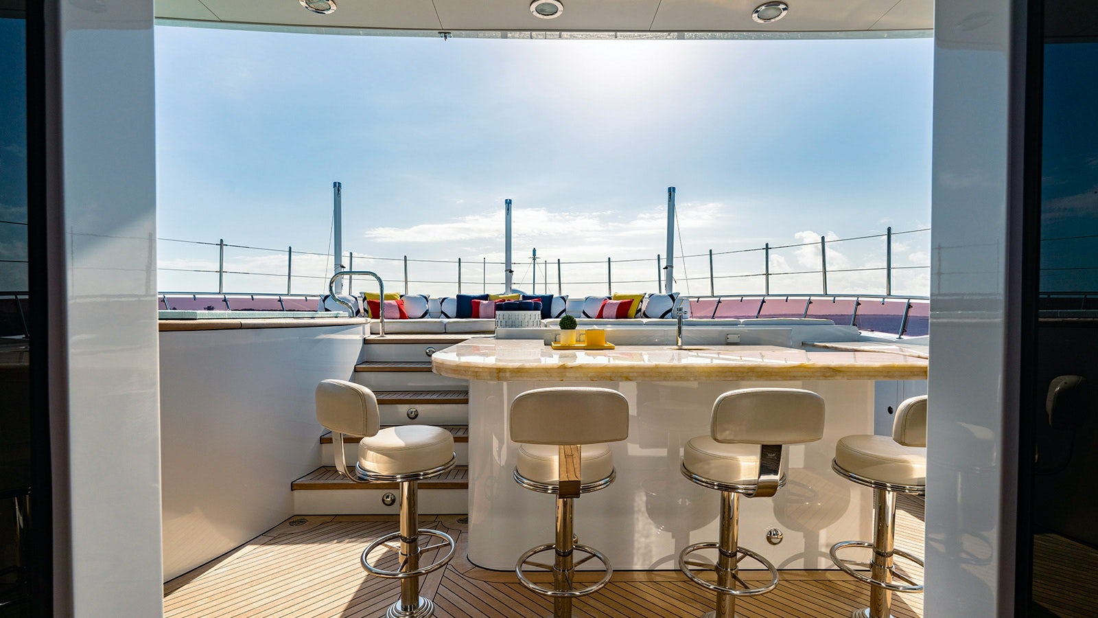 a room with tables and chairs aboard IRON BLONDE Yacht for Charter