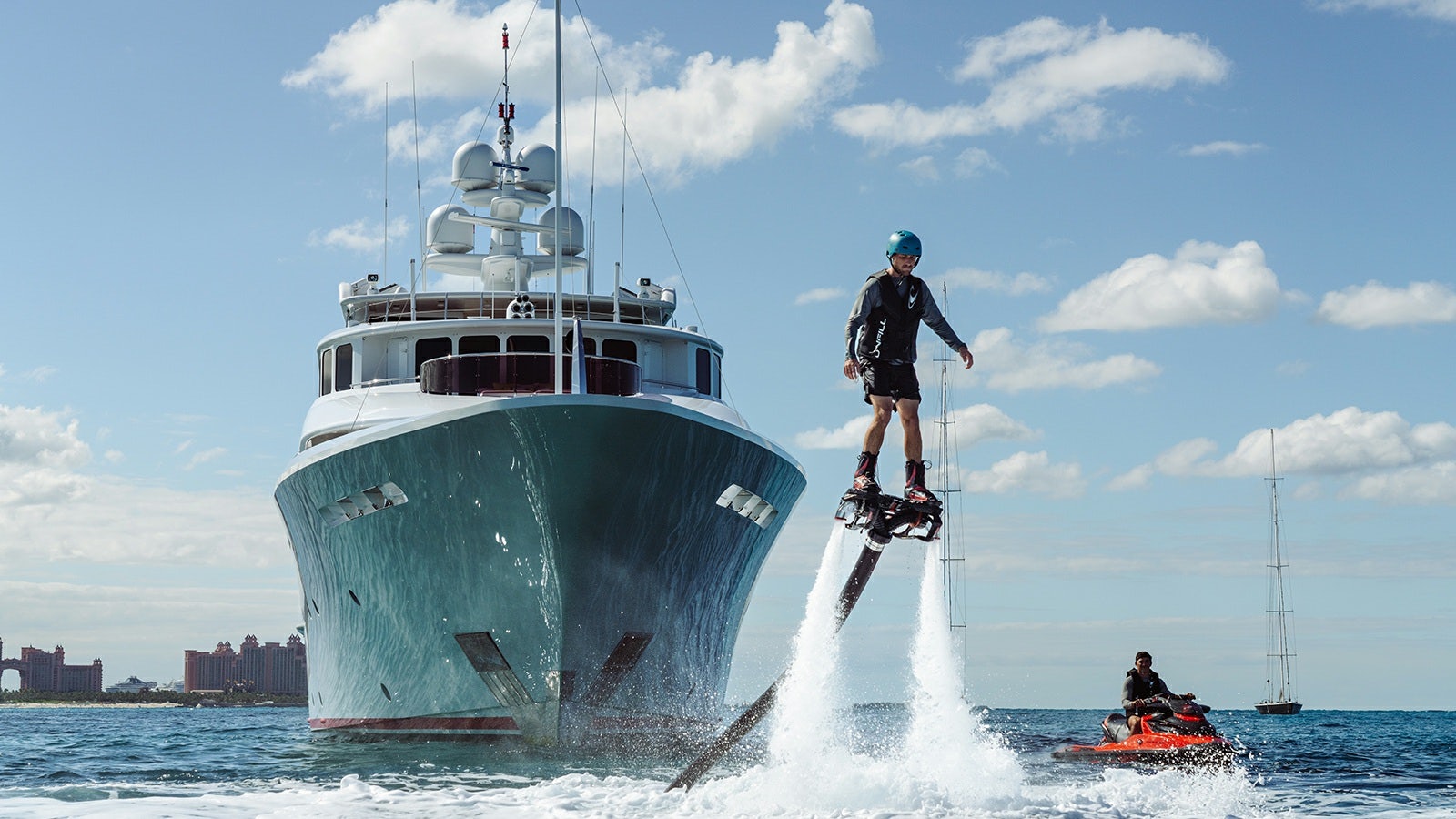 a boat with a person on it aboard IRON BLONDE Yacht for Charter