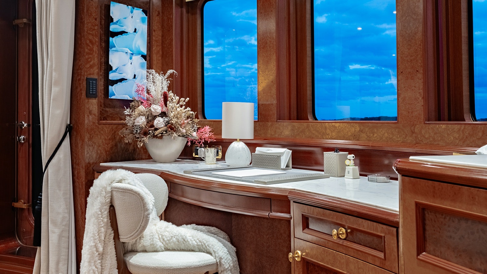 a bathroom with a large window aboard IRON BLONDE Yacht for Charter