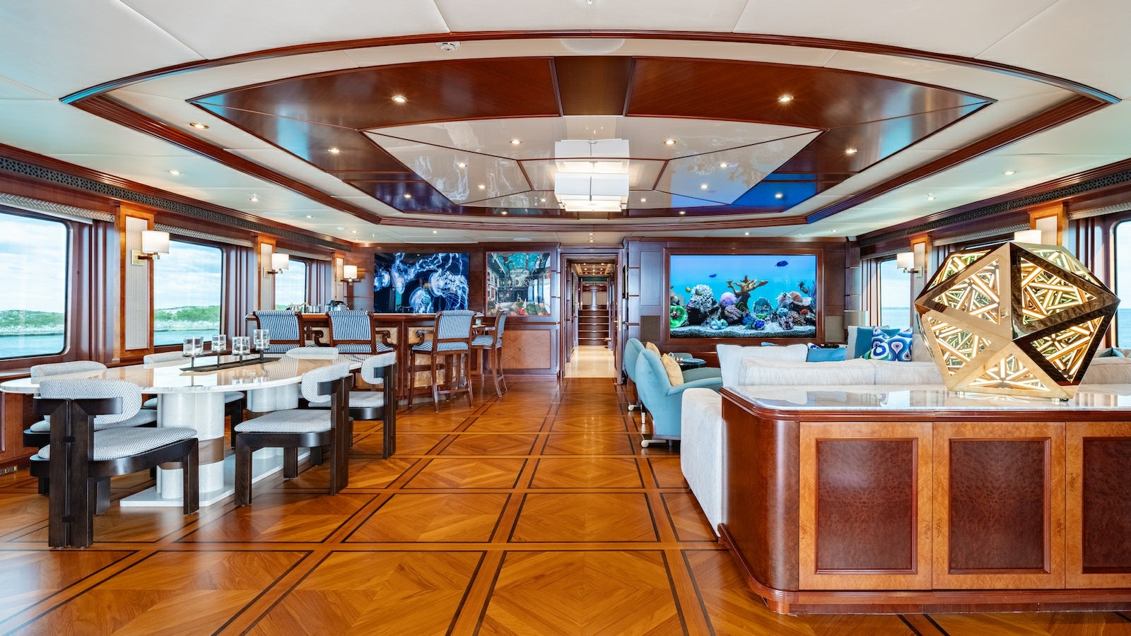 a room with tables and chairs aboard IRON BLONDE Yacht for Charter