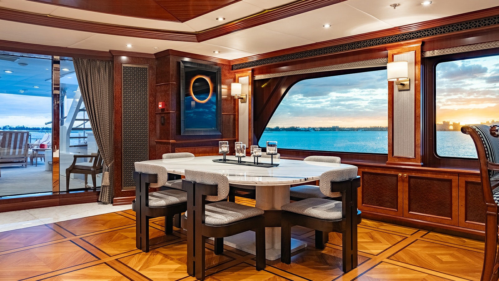 a table and chairs in a room aboard IRON BLONDE Yacht for Charter