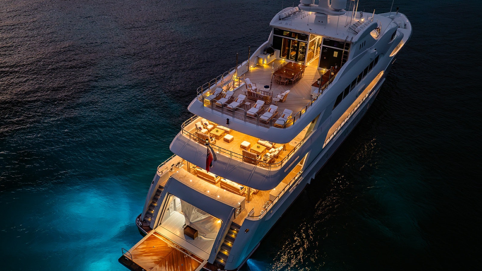 a large ship in the water aboard IRON BLONDE Yacht for Charter
