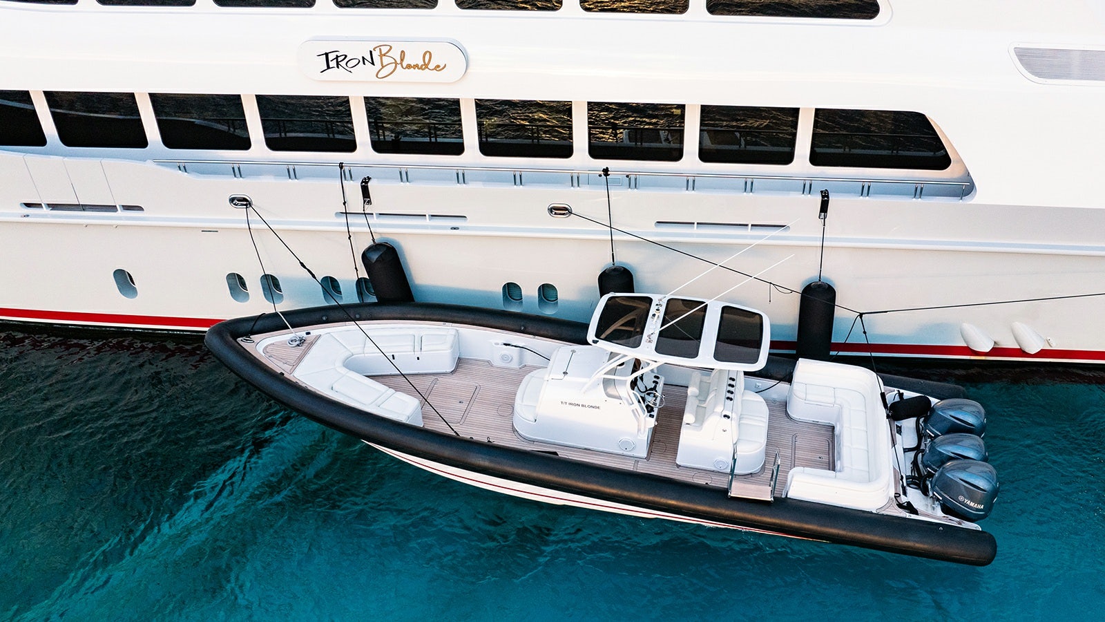 a white yacht in the water aboard IRON BLONDE Yacht for Charter