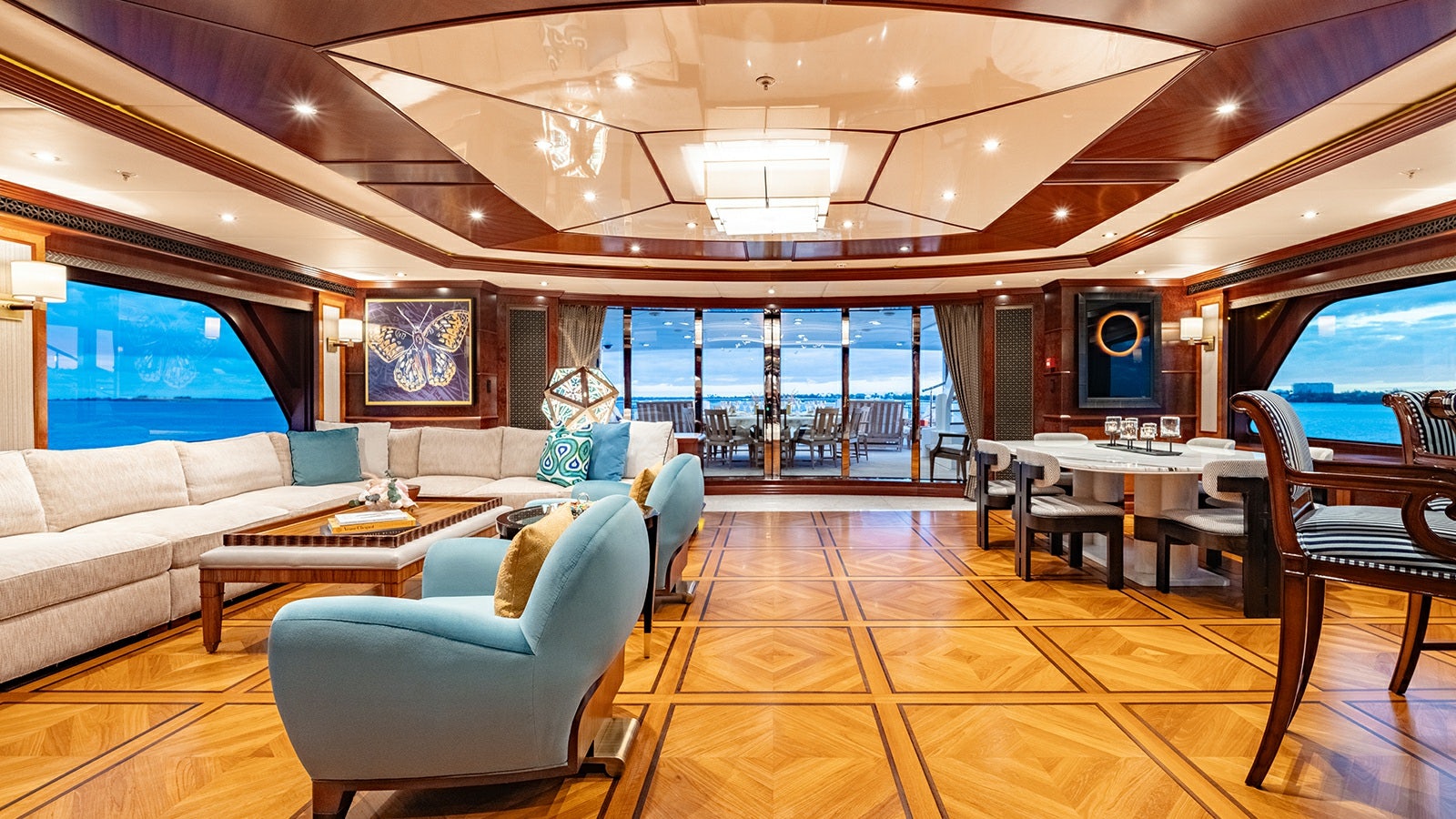 a room with a couch and a table and chairs aboard IRON BLONDE Yacht for Charter