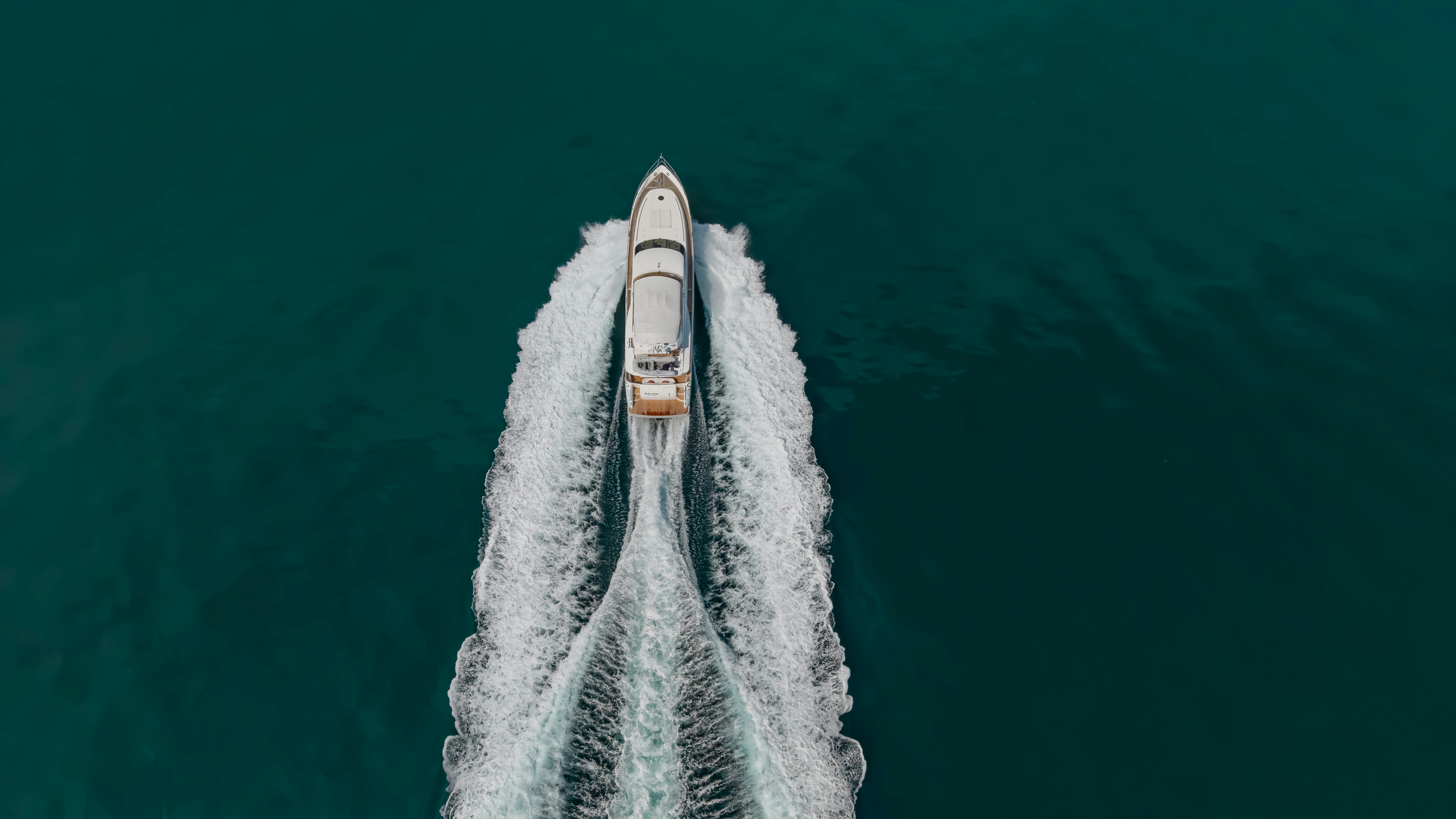 a rocket flying over a sea aboard BLUE ROSE Yacht for Sale
