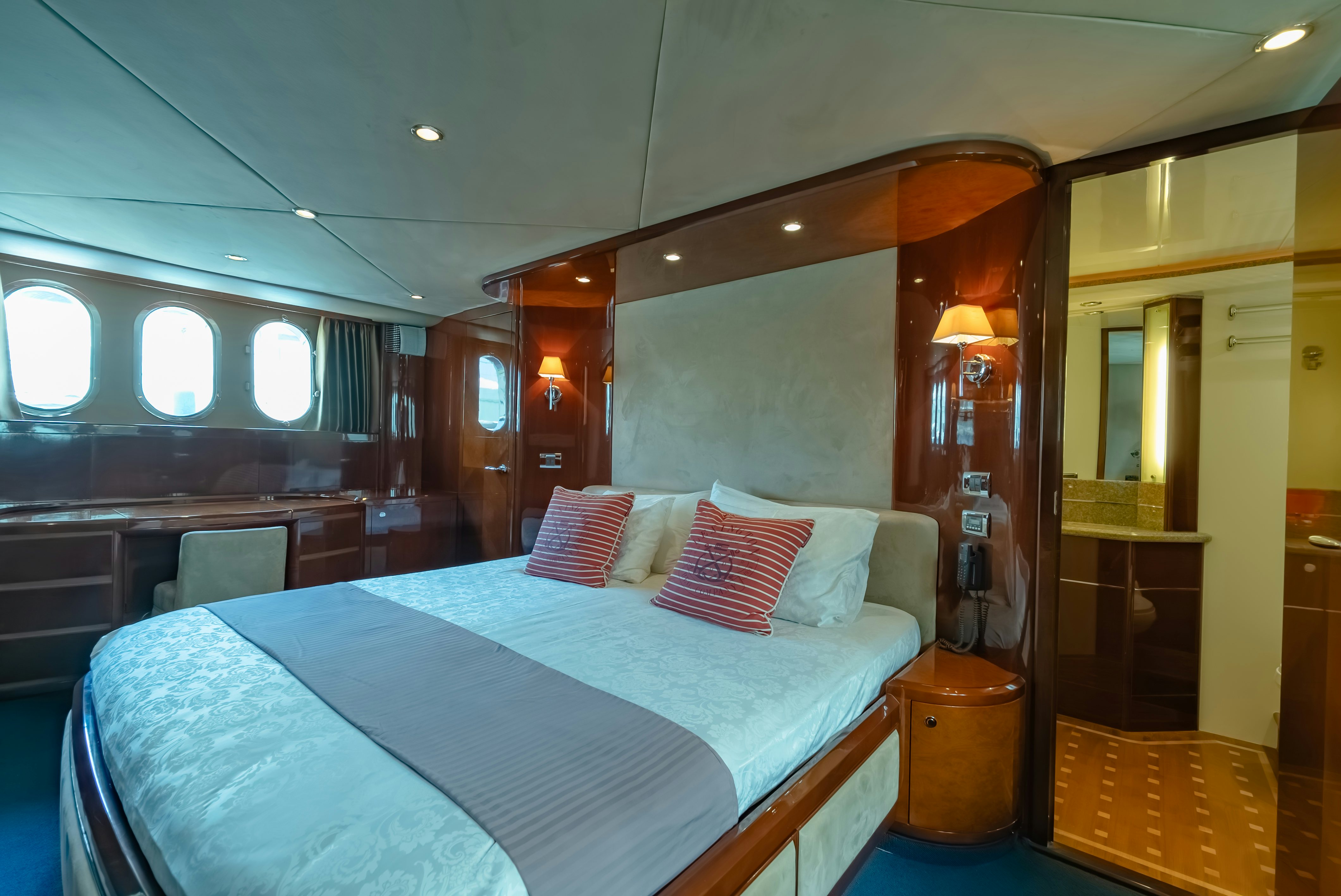 a bed in a room aboard BLUE ROSE Yacht for Sale