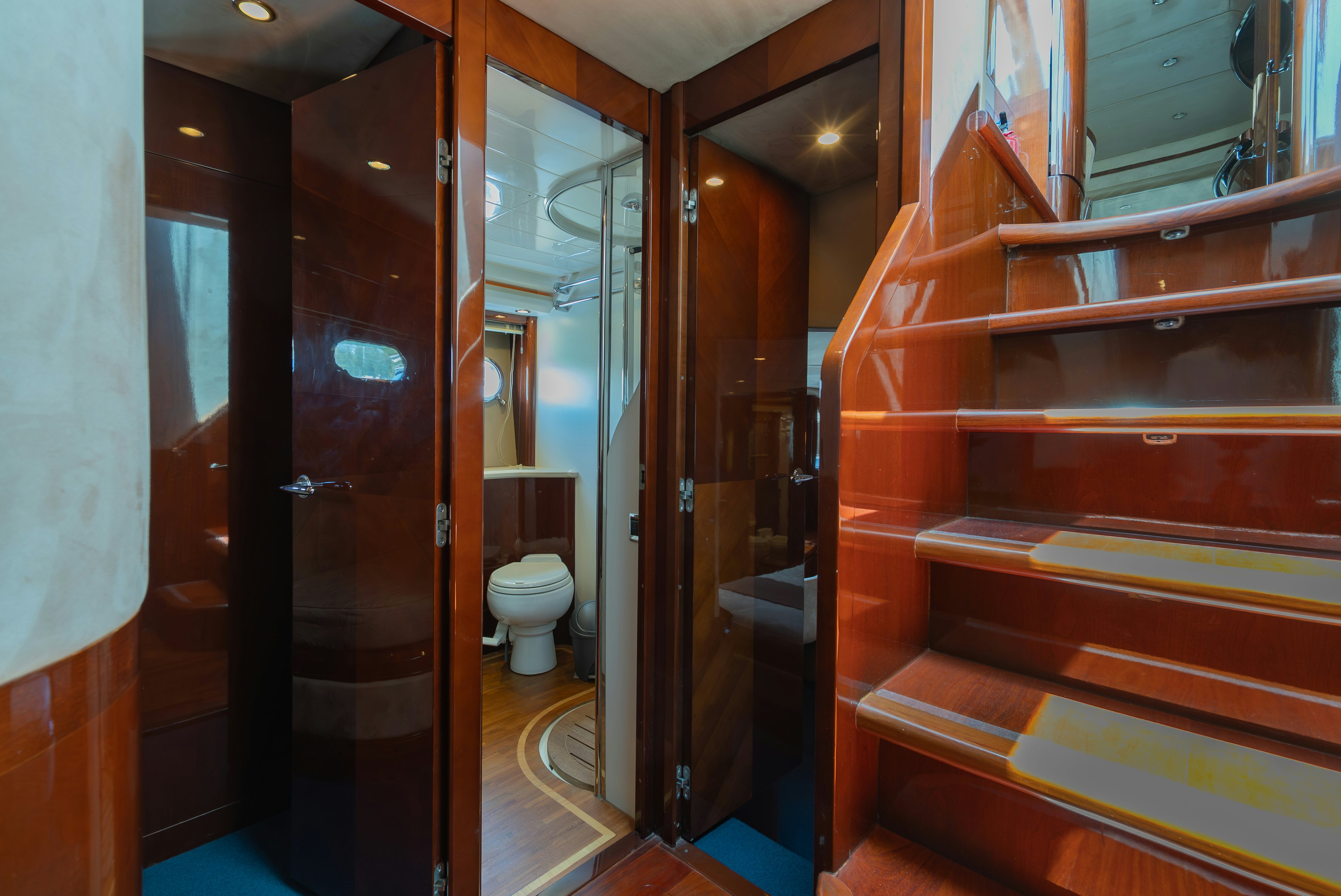 a bathroom with a wood cabinet aboard BLUE ROSE Yacht for Sale
