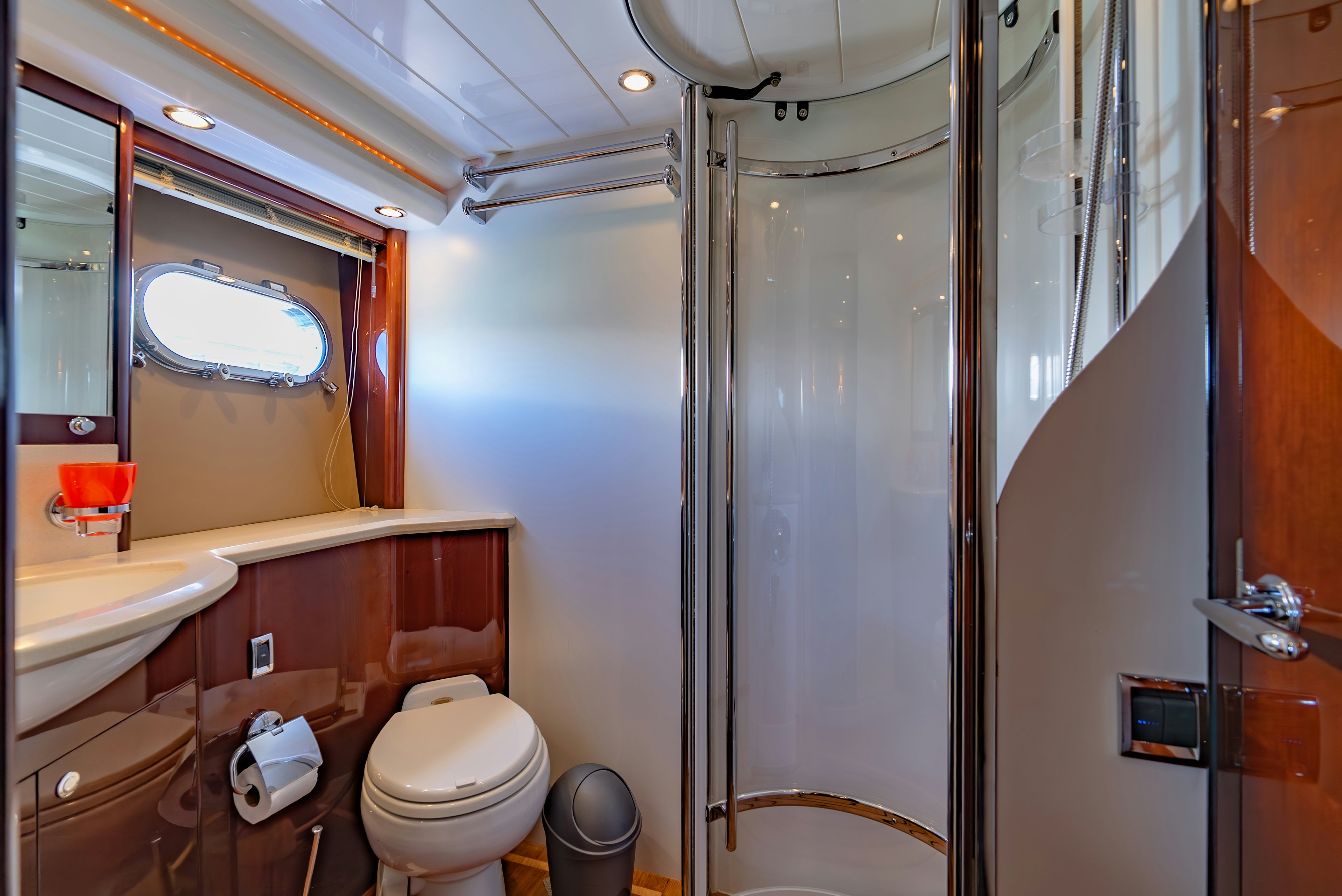 a bathroom with a glass shower aboard BLUE ROSE Yacht for Sale