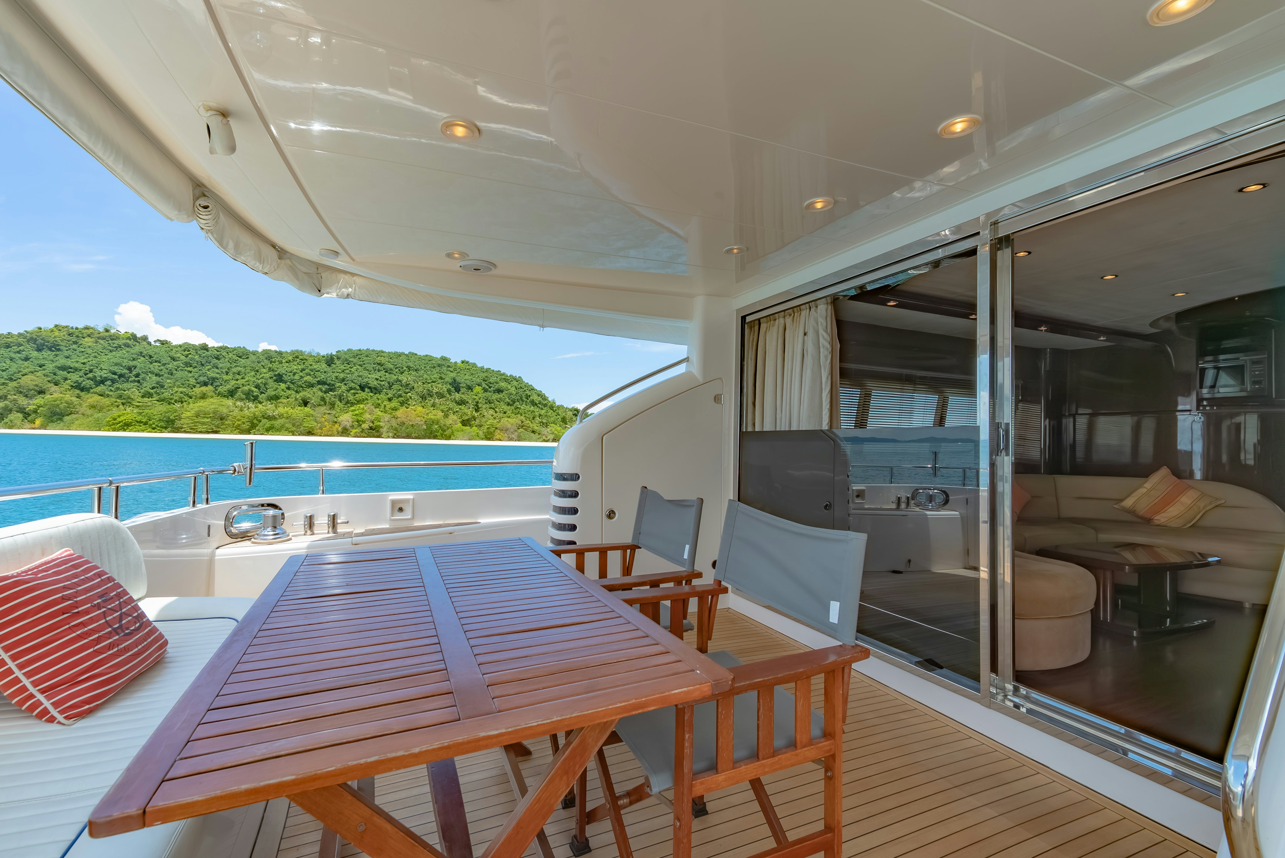 a table and chairs on a boat aboard BLUE ROSE Yacht for Sale