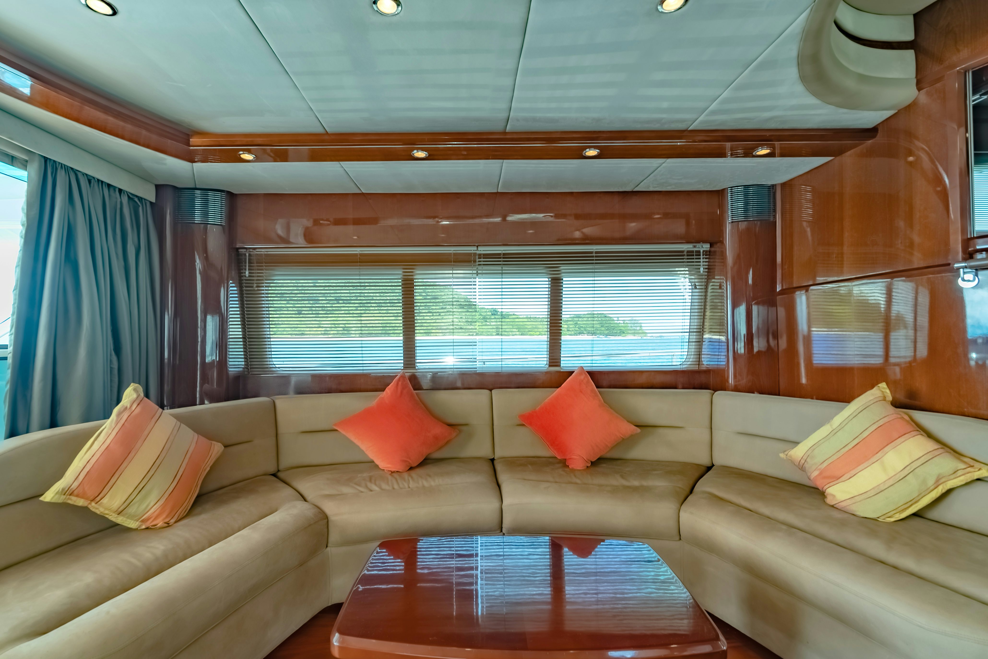 a couch with pillows on it aboard BLUE ROSE Yacht for Sale