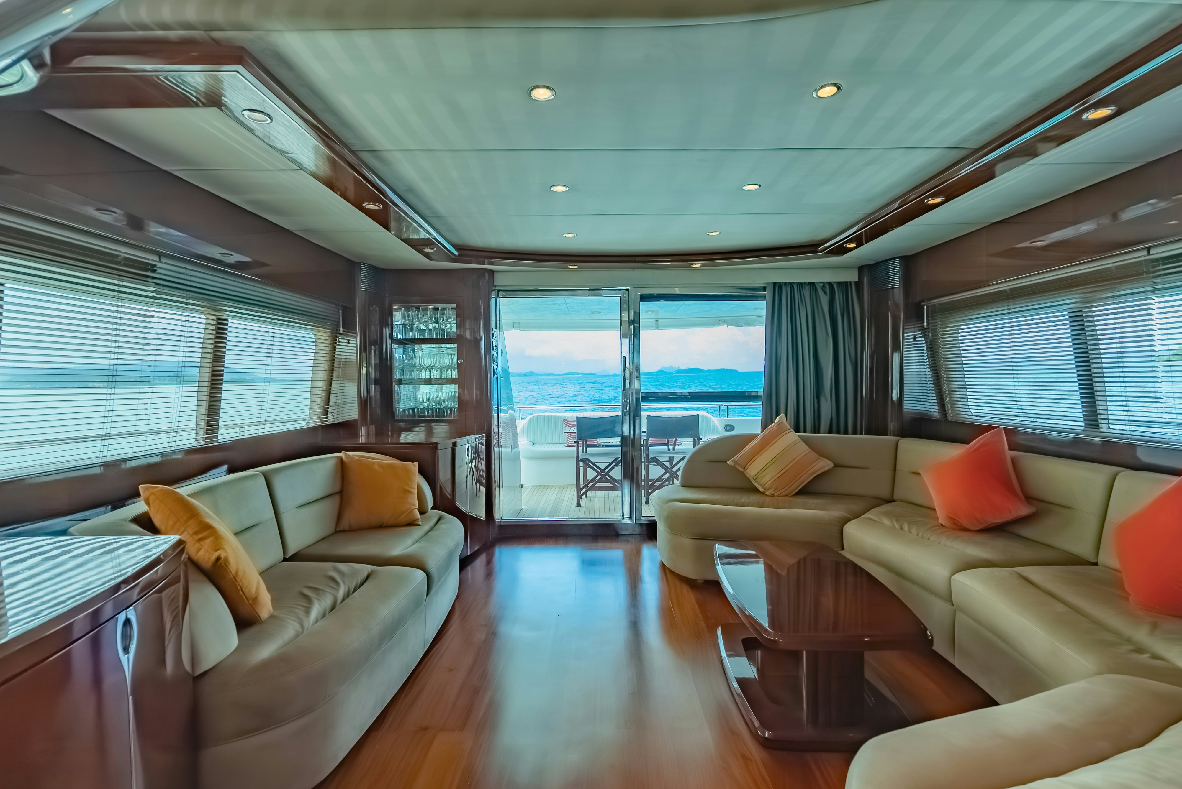 a living room with a large window aboard BLUE ROSE Yacht for Sale