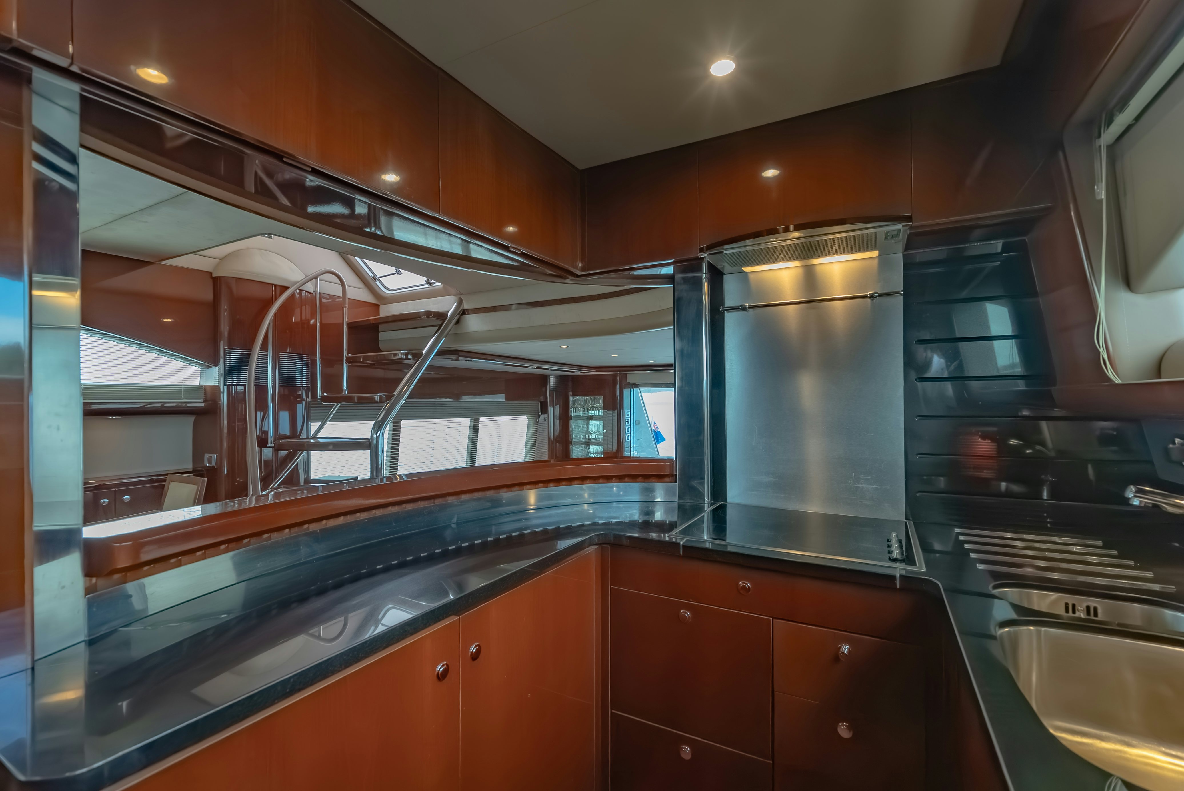 a kitchen with a large stainless steel oven and cabinets aboard BLUE ROSE Yacht for Sale