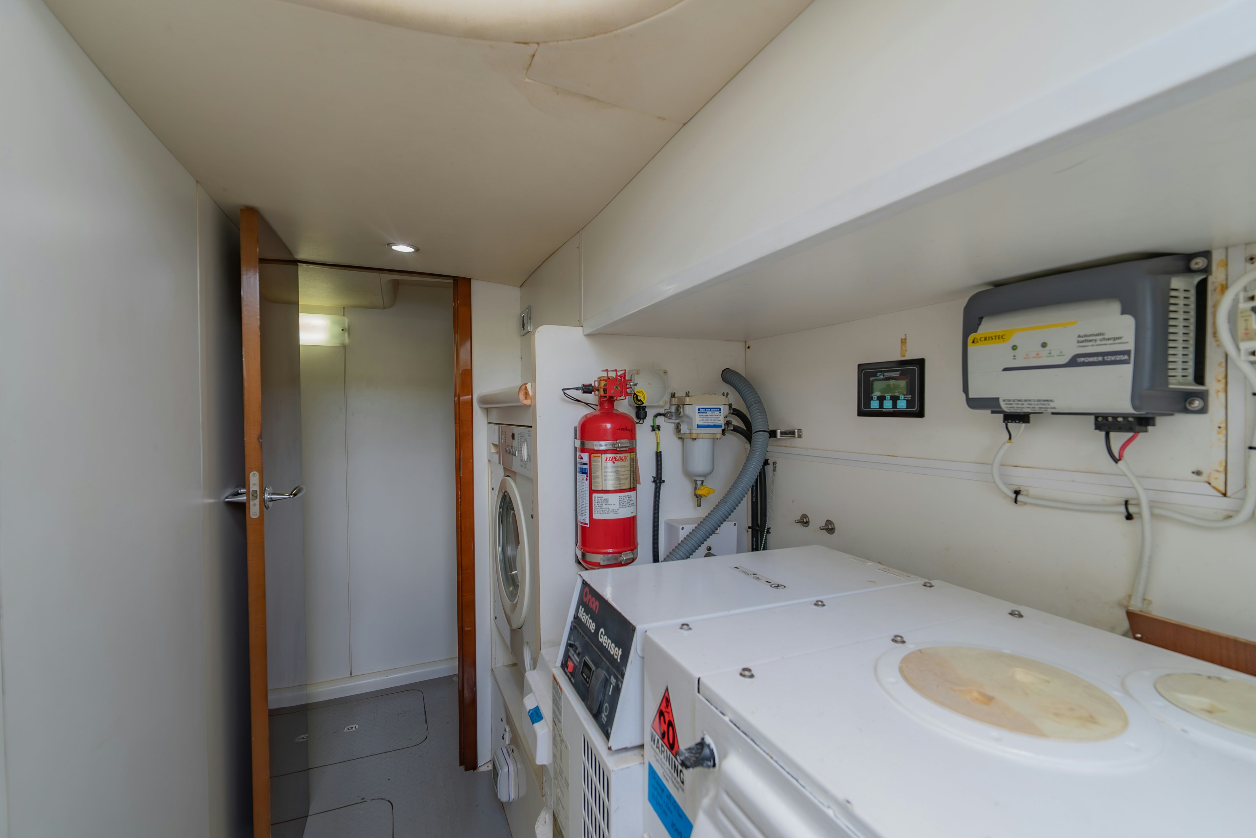 a white machine in a room aboard BLUE ROSE Yacht for Sale