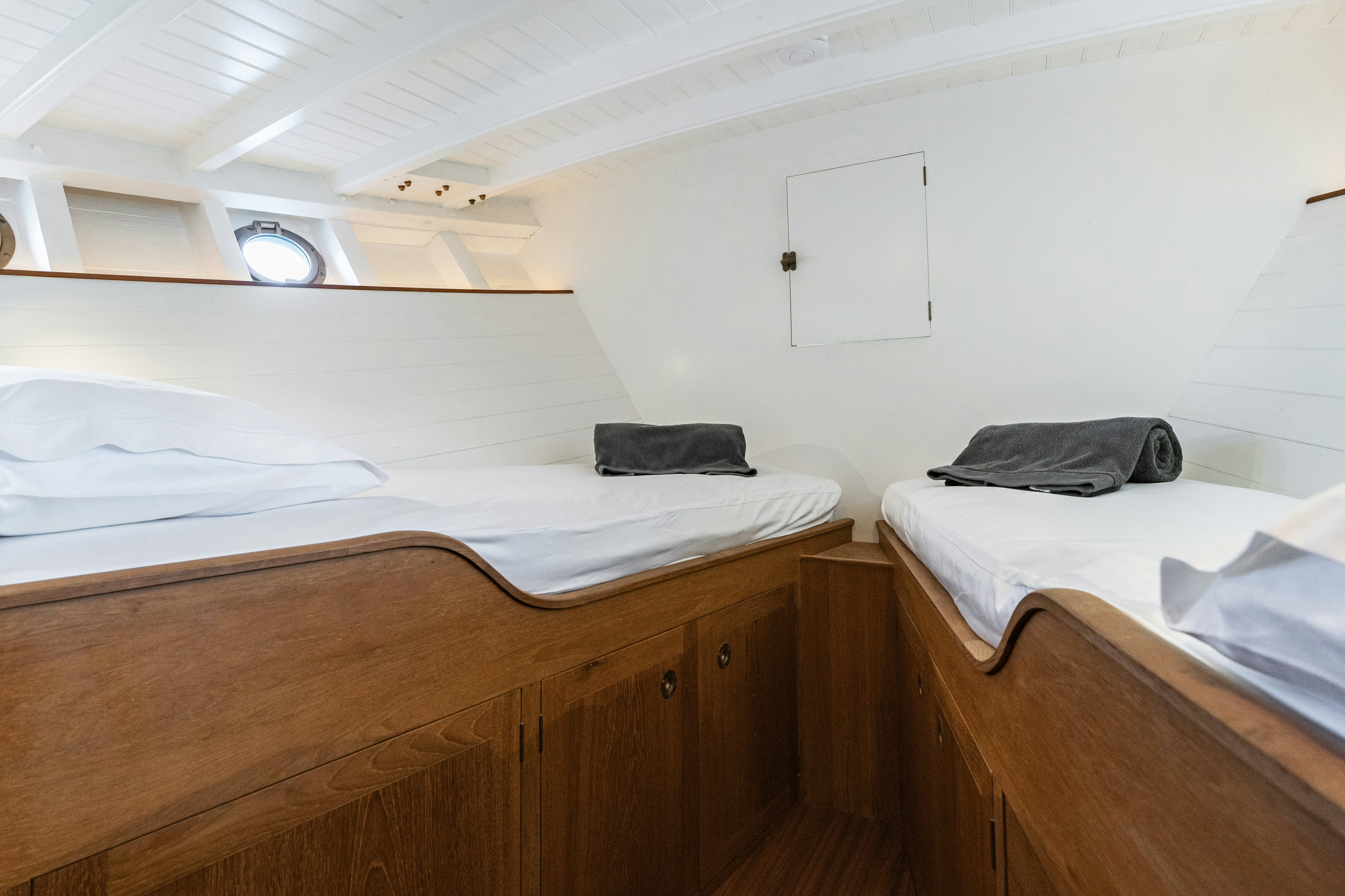 a room with two beds aboard SILVER LASS Yacht for Sale