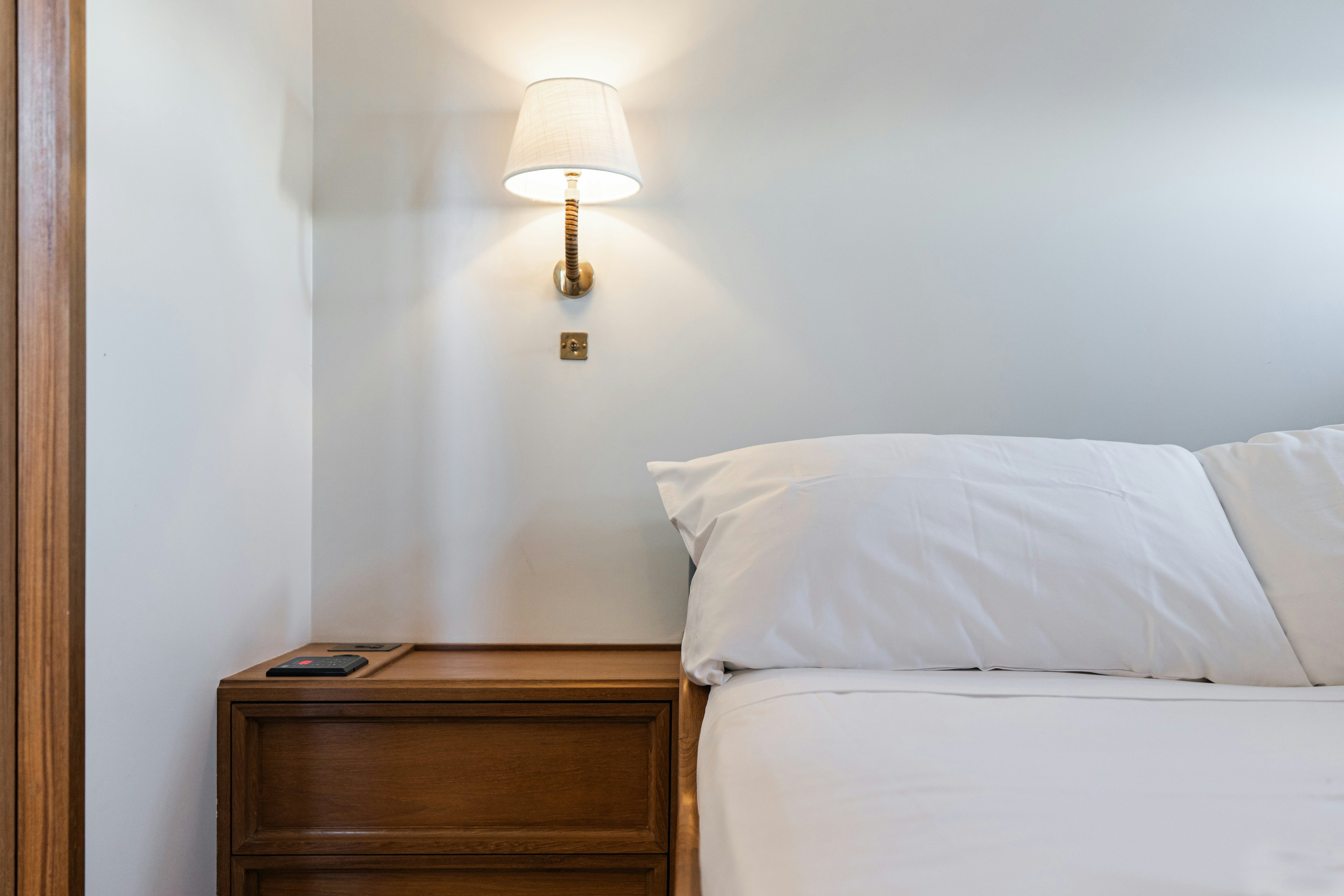 a lamp on a bed aboard SILVER LASS Yacht for Sale