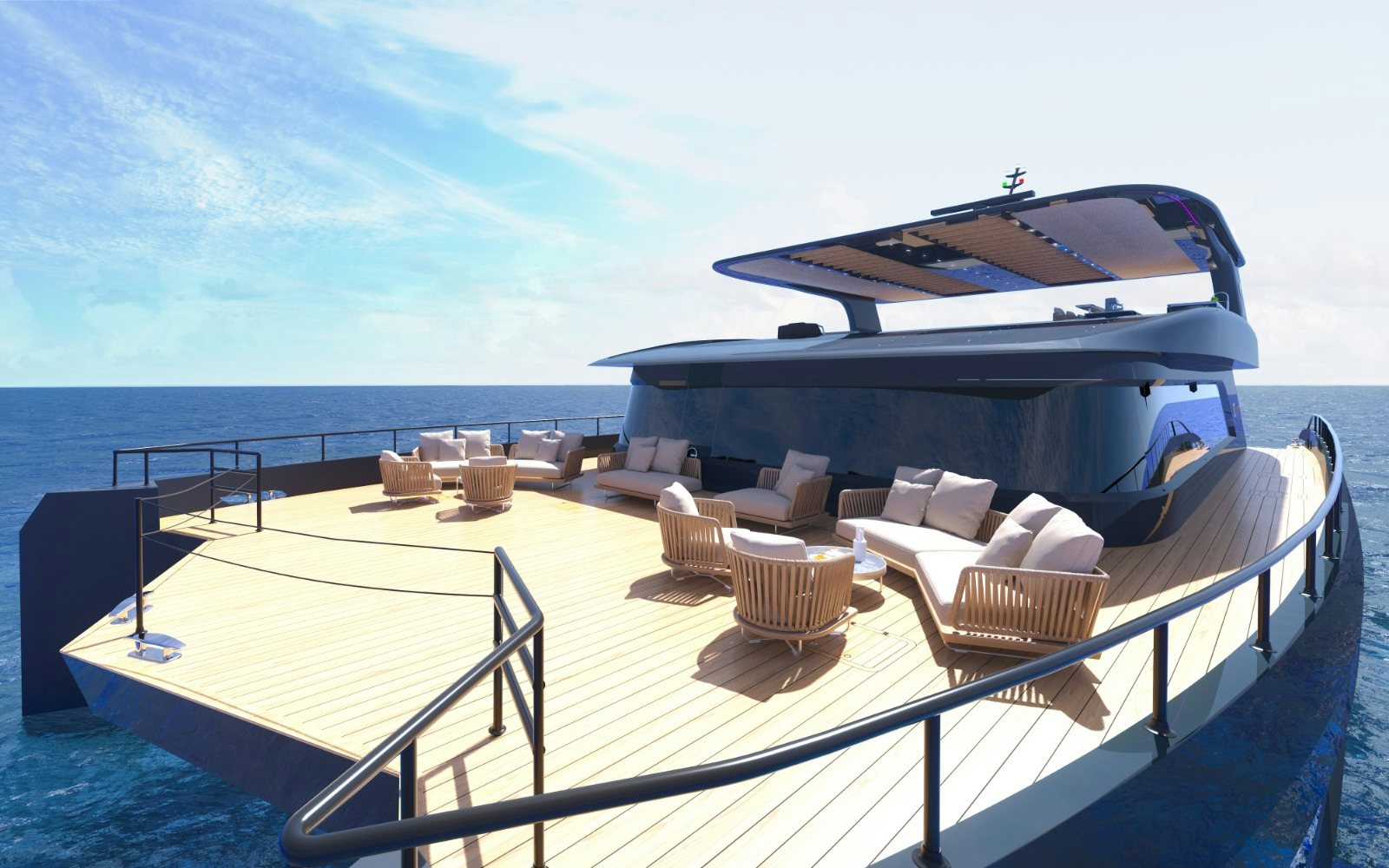 a lounge area with a large lounge chair and a large body of water aboard VISION F – 101 ALU Yacht for Sale
