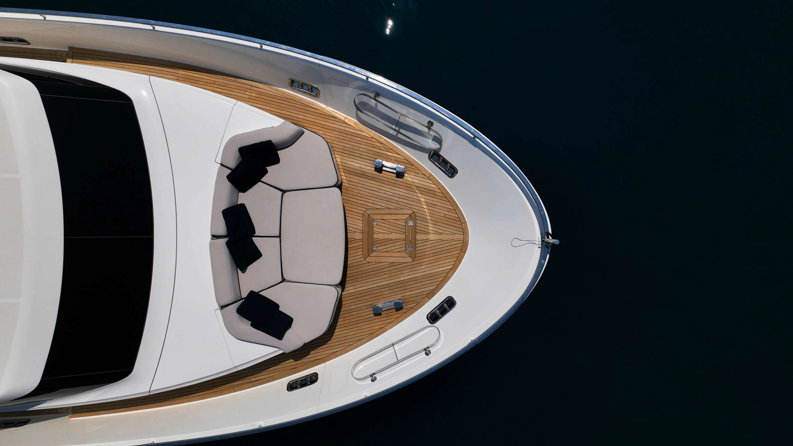 a white and black car aboard FRANCAMARINA Yacht for Charter