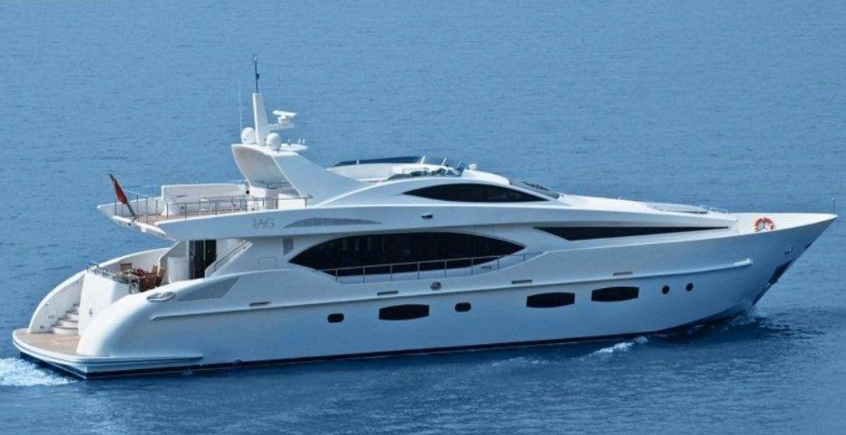 a white yacht in the water aboard SUNRISE Yacht for Sale