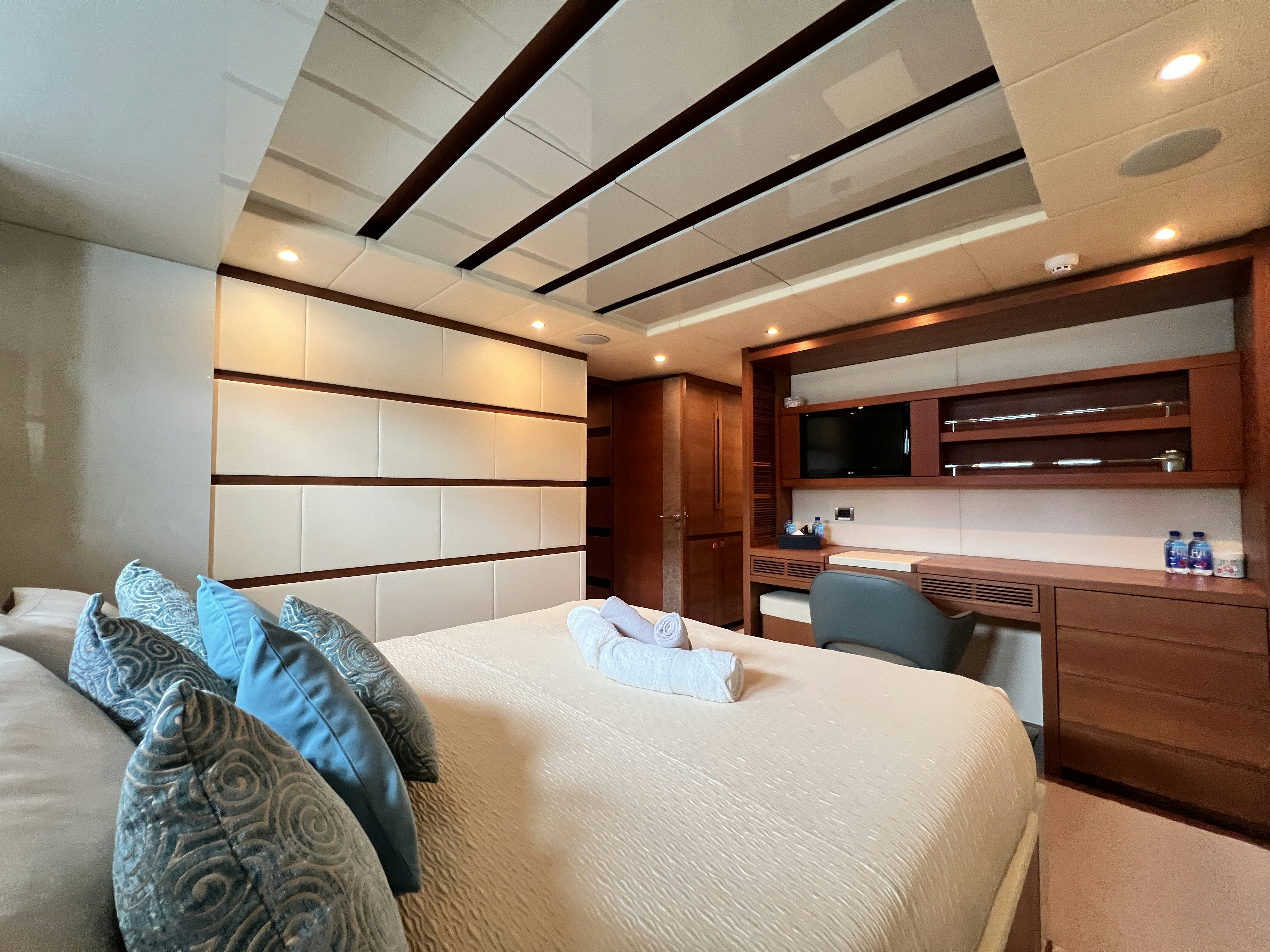 a bed in a room aboard SUNRISE Yacht for Sale