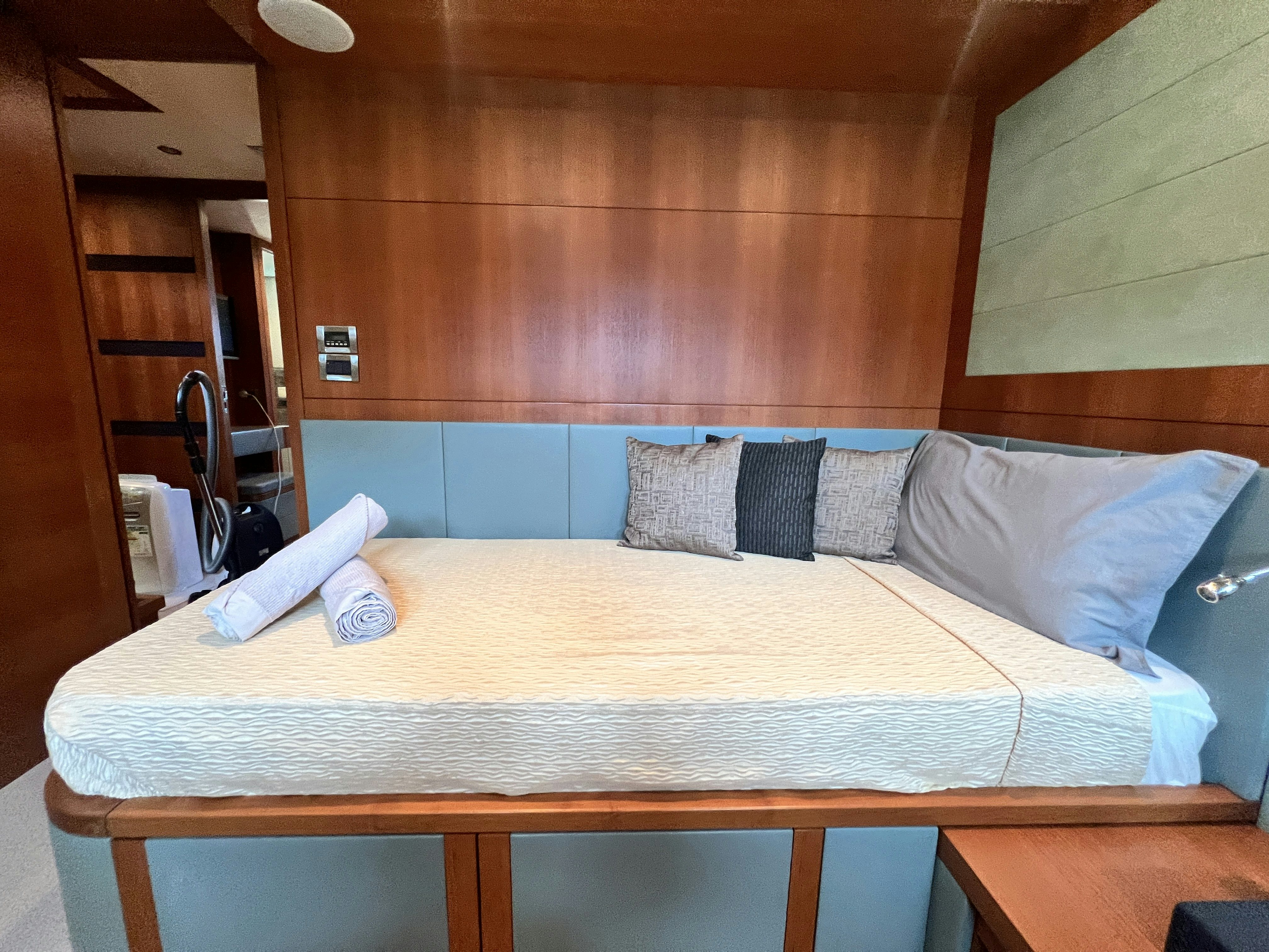 a bed with pillows aboard SUNRISE Yacht for Sale
