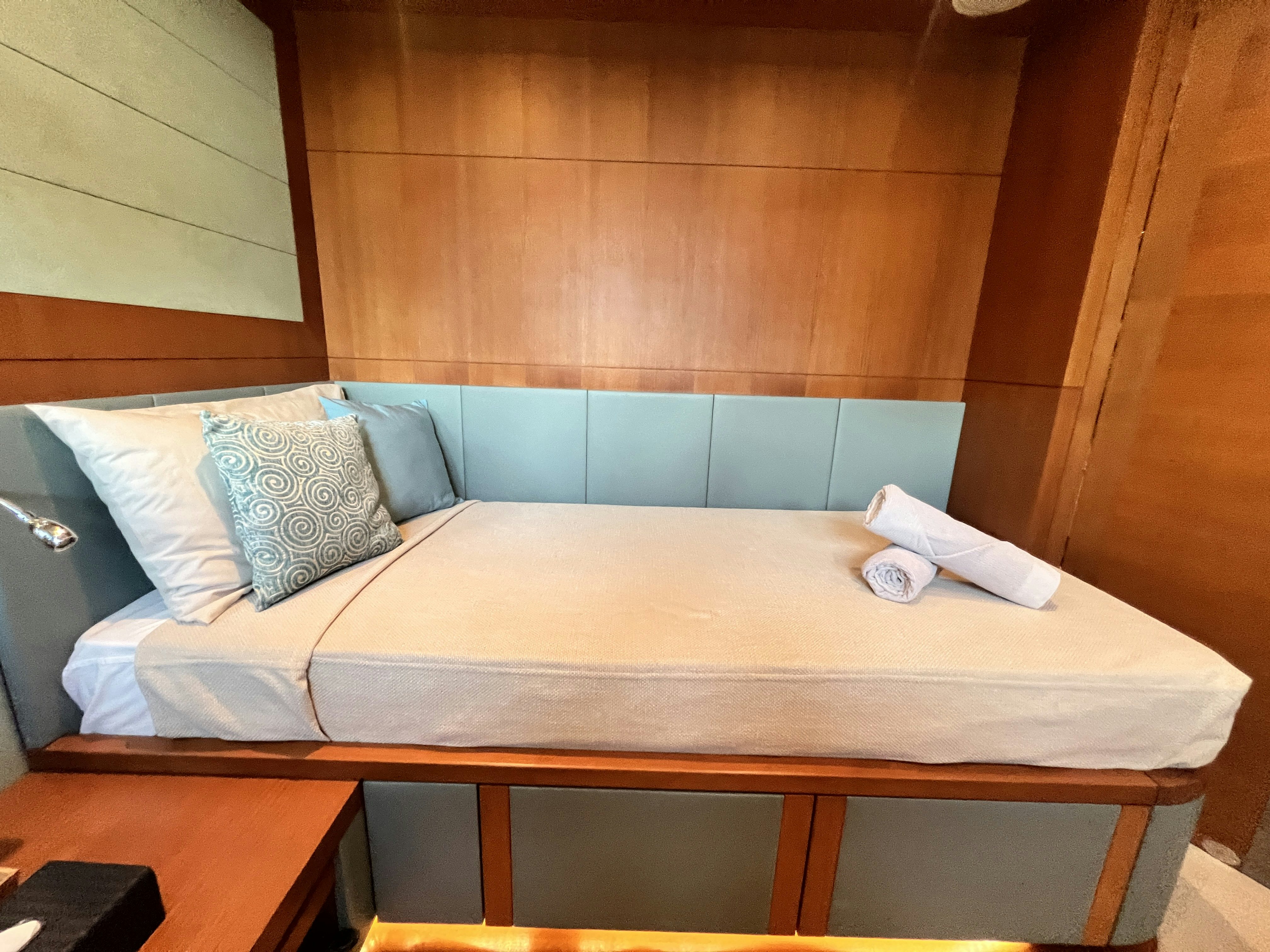 a bed with pillows aboard SUNRISE Yacht for Sale