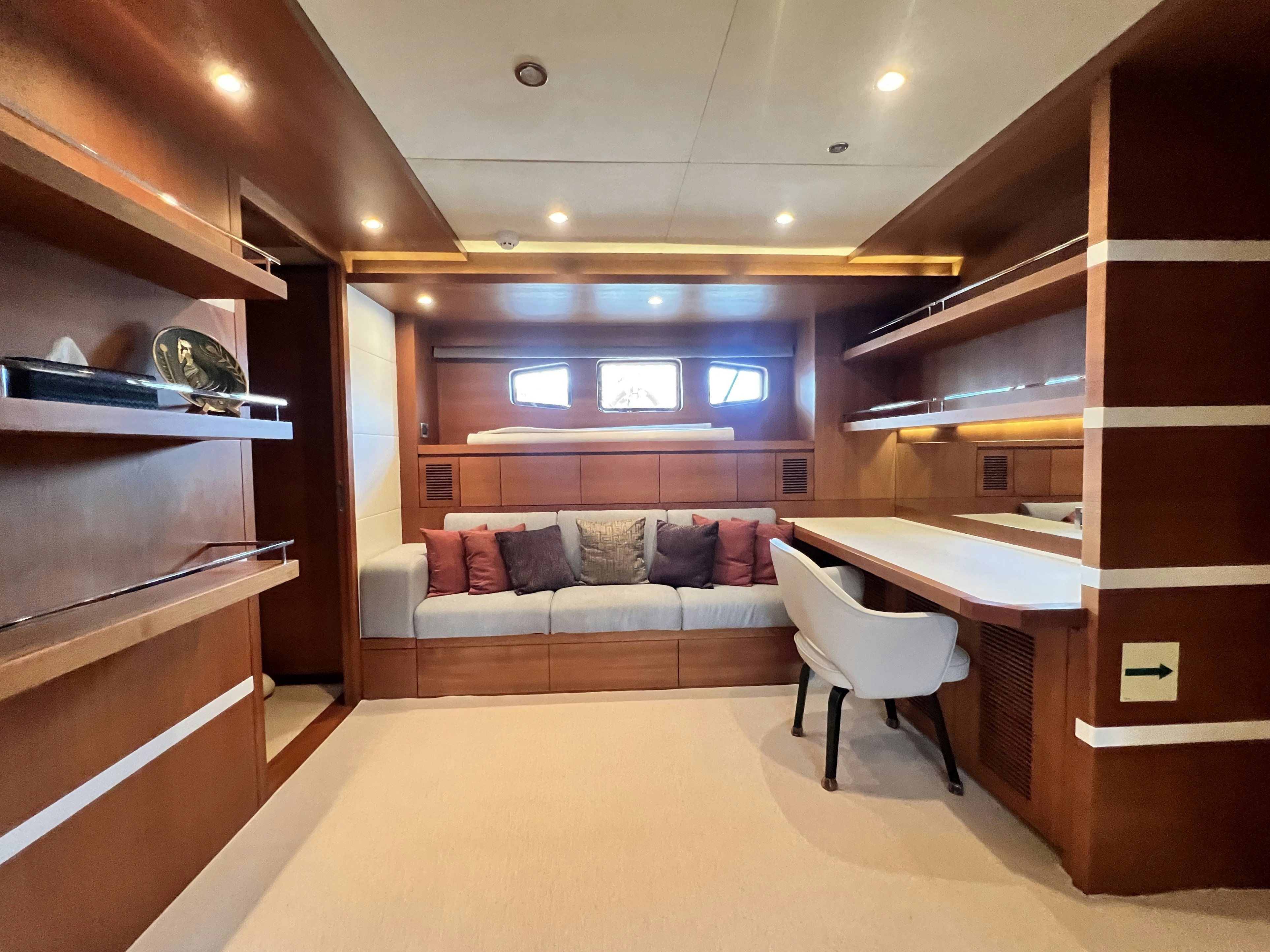 a room with a couch and a table aboard SUNRISE Yacht for Sale