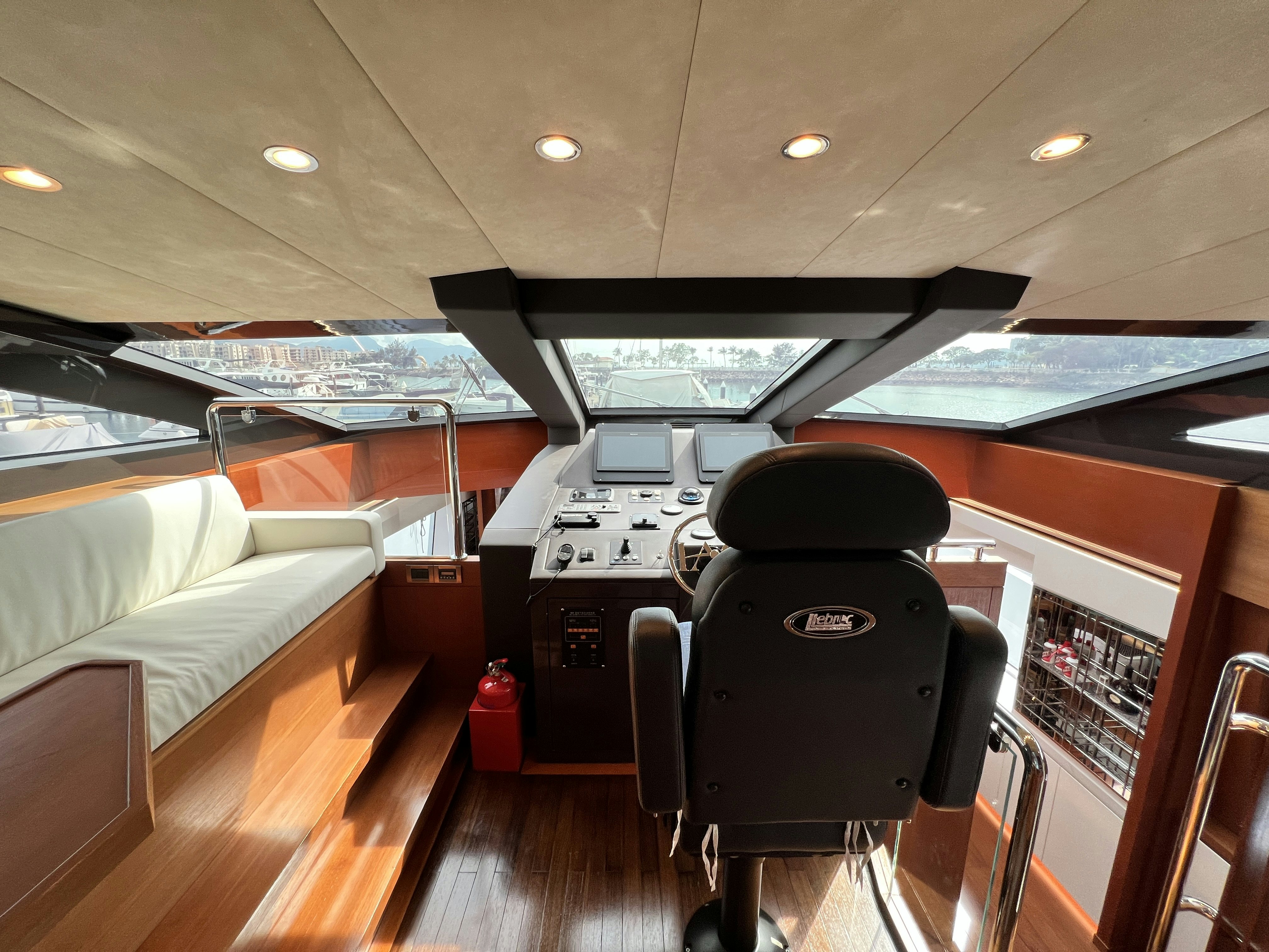 a room with a large desk and a large window aboard SUNRISE Yacht for Sale
