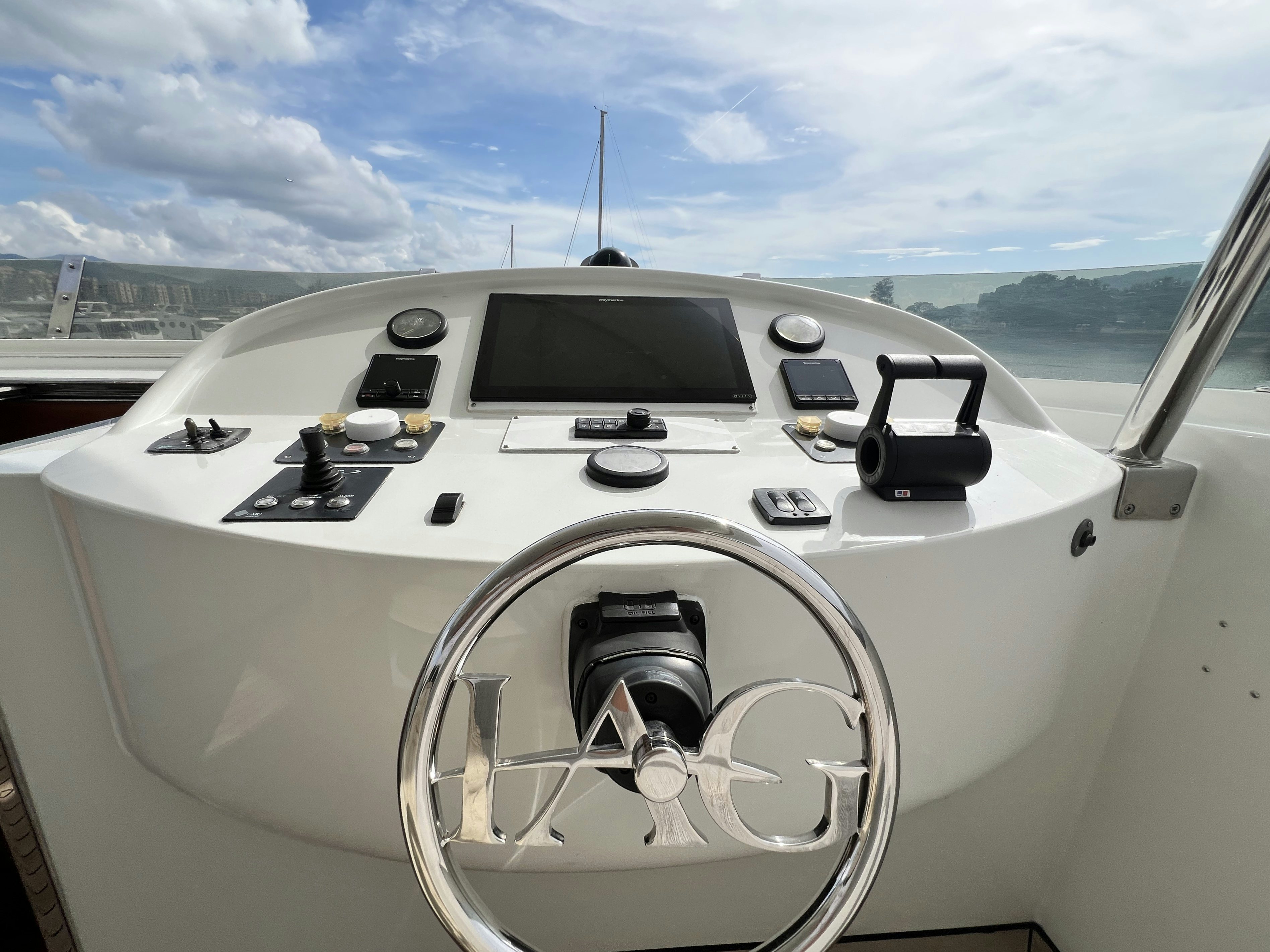 the inside of a white car aboard SUNRISE Yacht for Sale