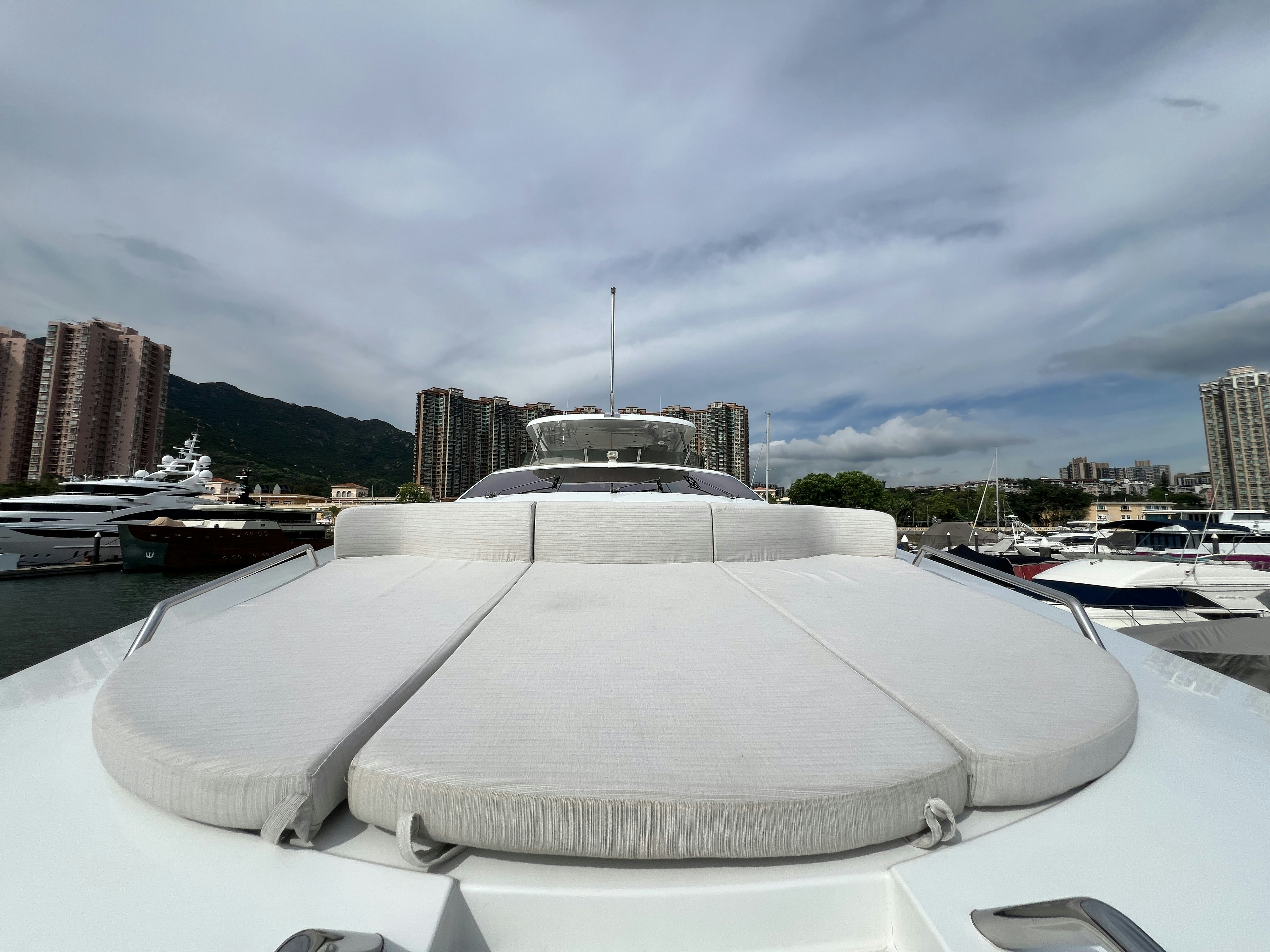 a large white building with a dome roof and a city in the background aboard SUNRISE Yacht for Sale
