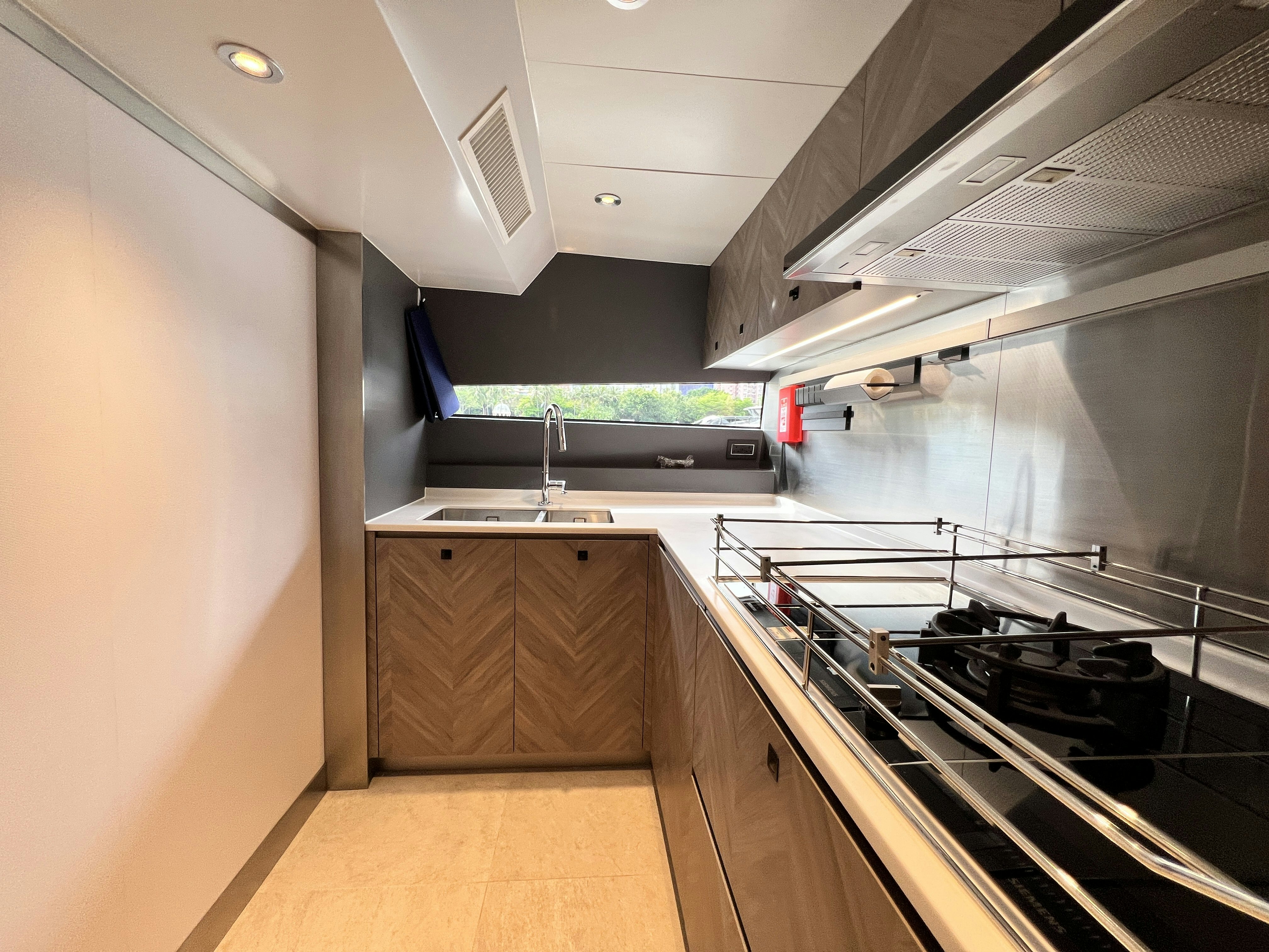 a kitchen with a large island aboard SUNRISE Yacht for Sale