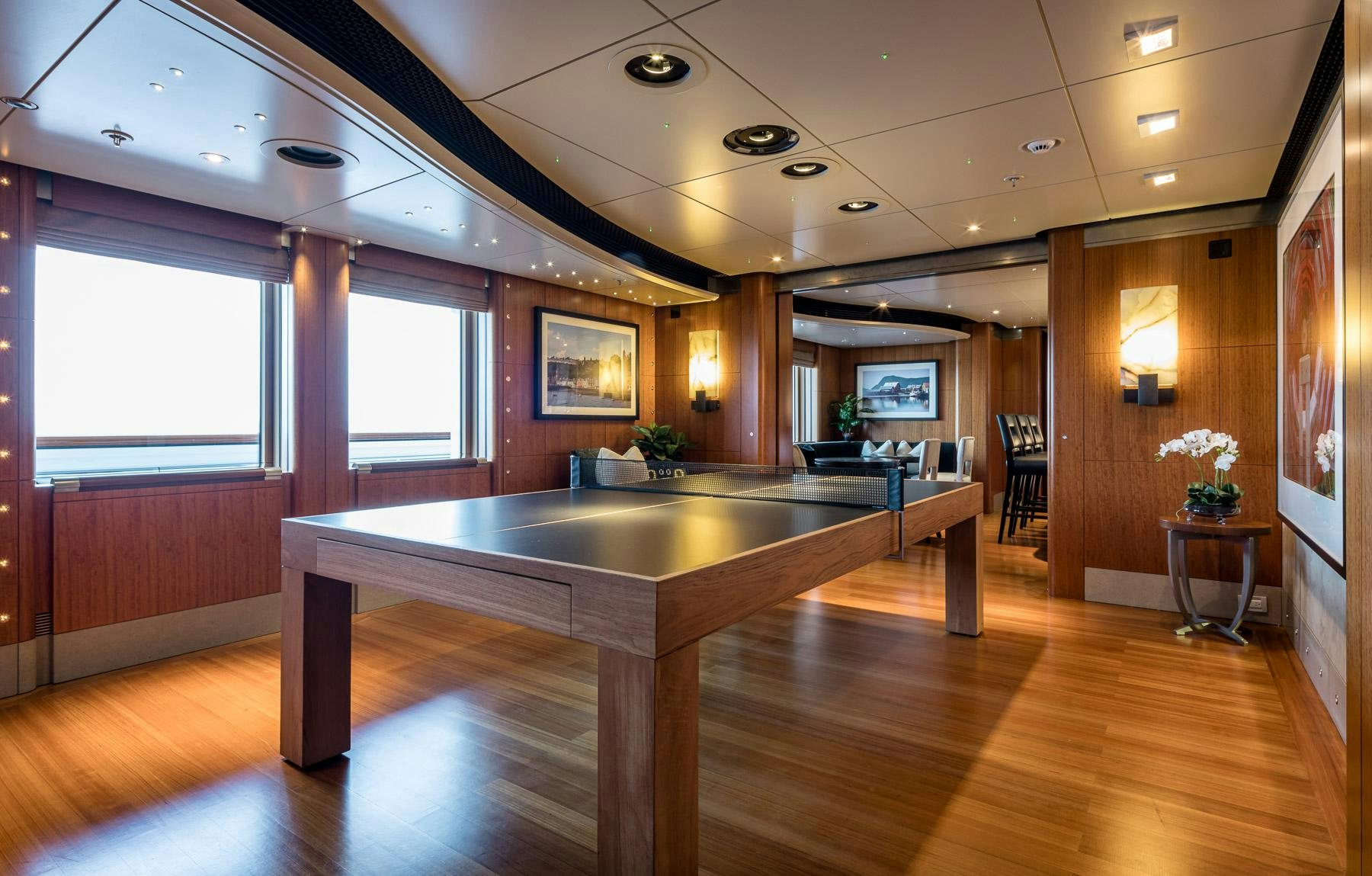 a large kitchen with a large island aboard OCTOPUS Yacht for Charter