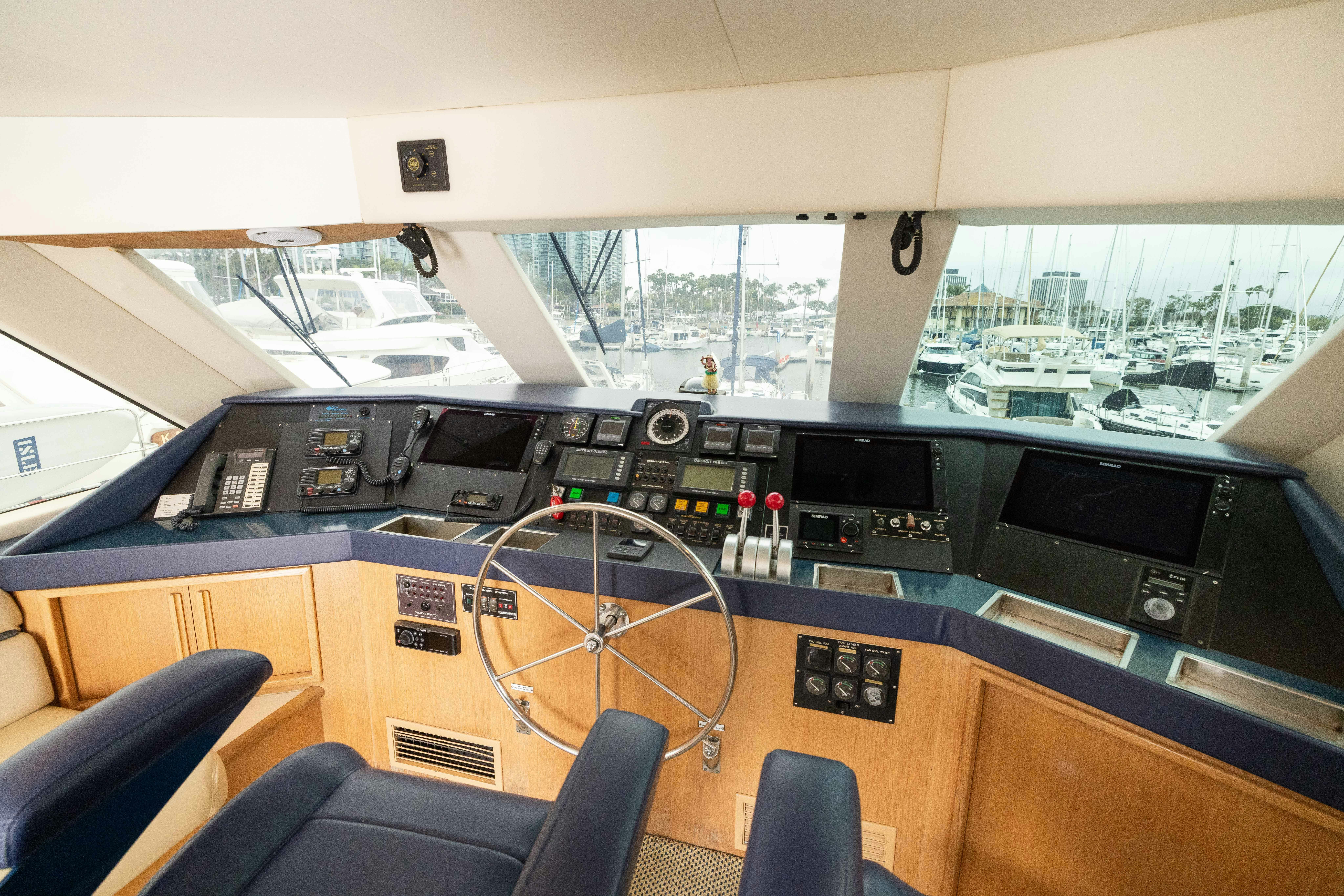 a room with many electronic devices aboard PREMIUM Yacht for Sale