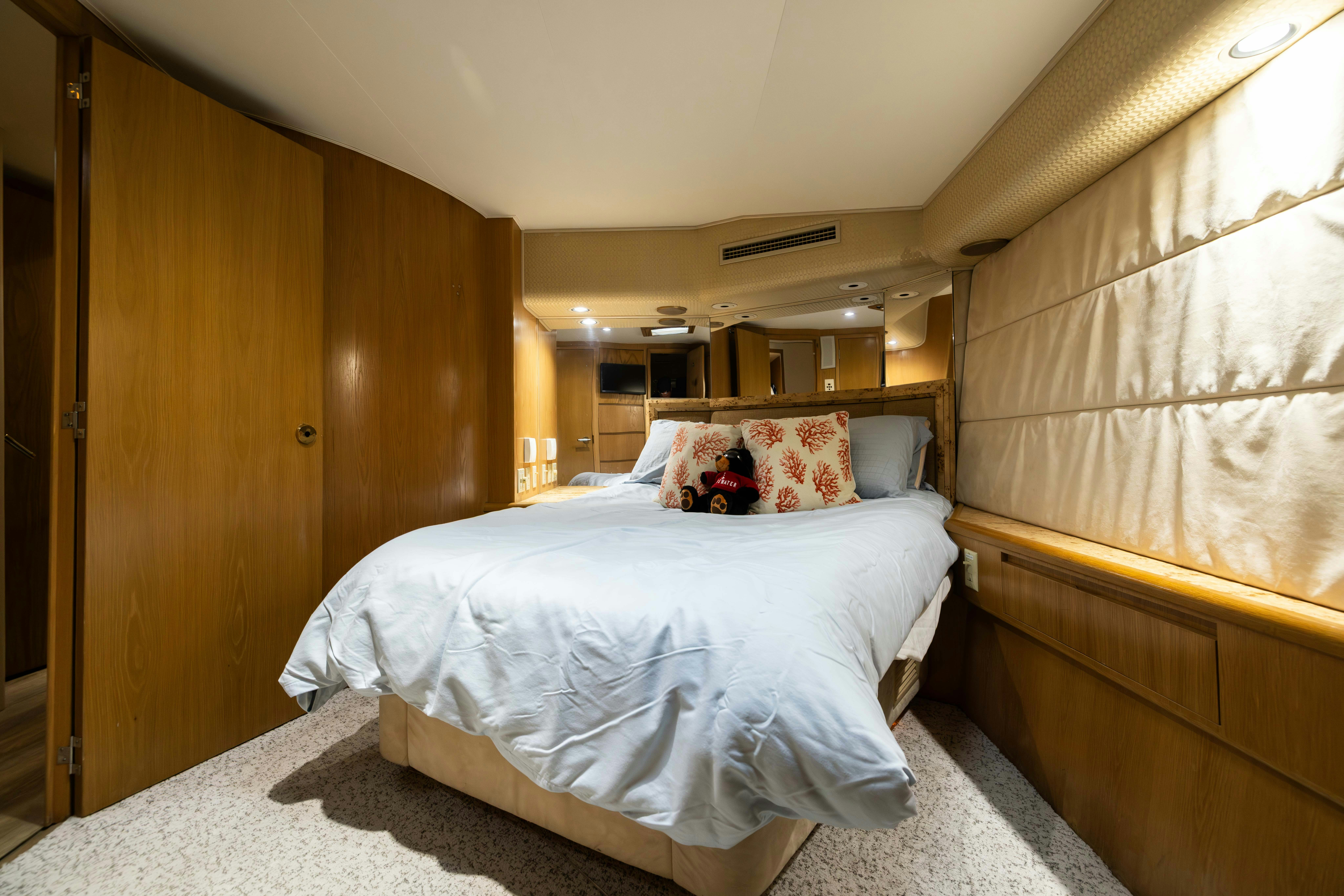 a bed in a room aboard PREMIUM Yacht for Sale