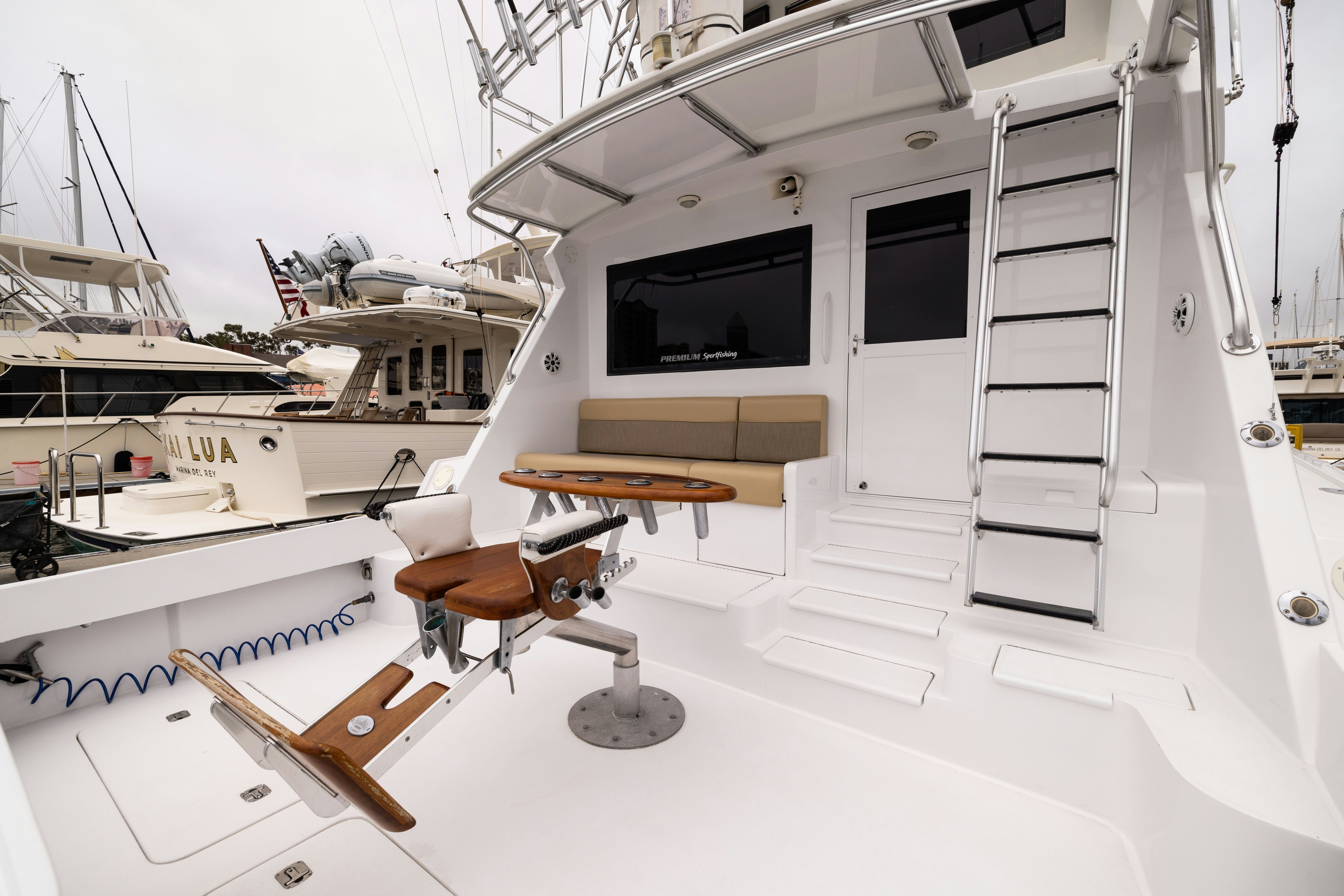 a boat with a bench aboard PREMIUM Yacht for Sale