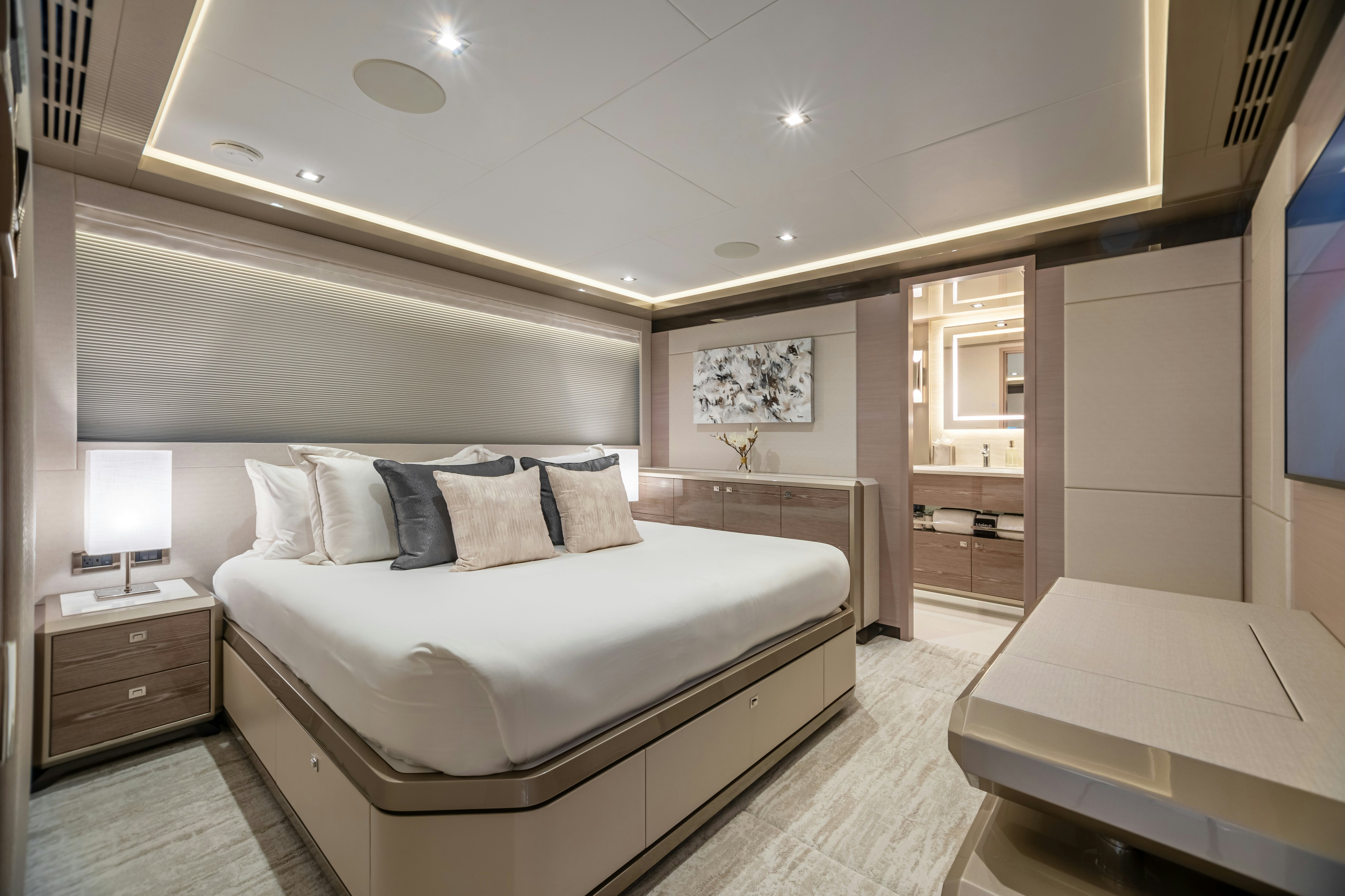 a large bedroom with a bed aboard BOA VIDA Yacht for Charter