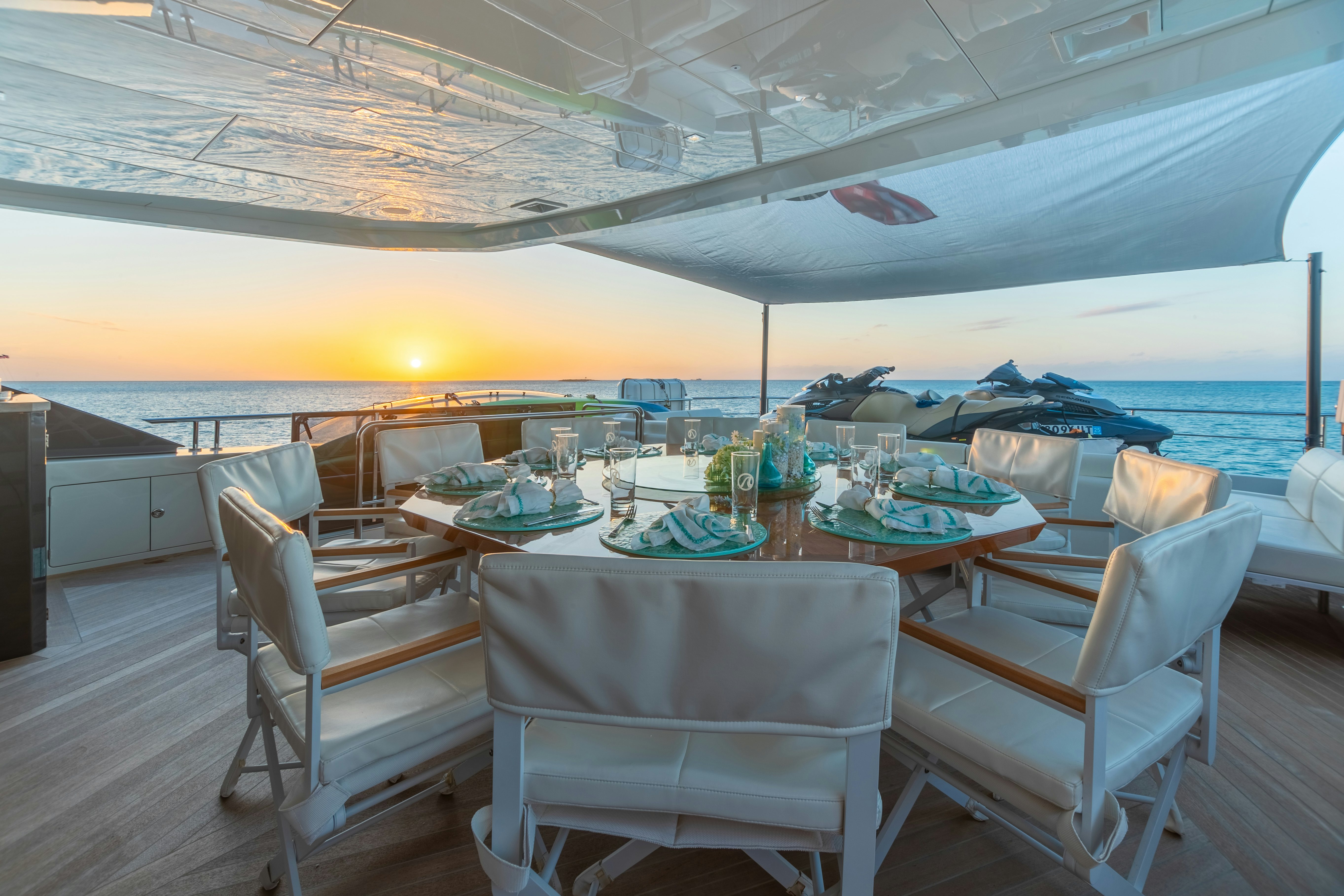 a large outdoor dining area aboard BOA VIDA Yacht for Charter