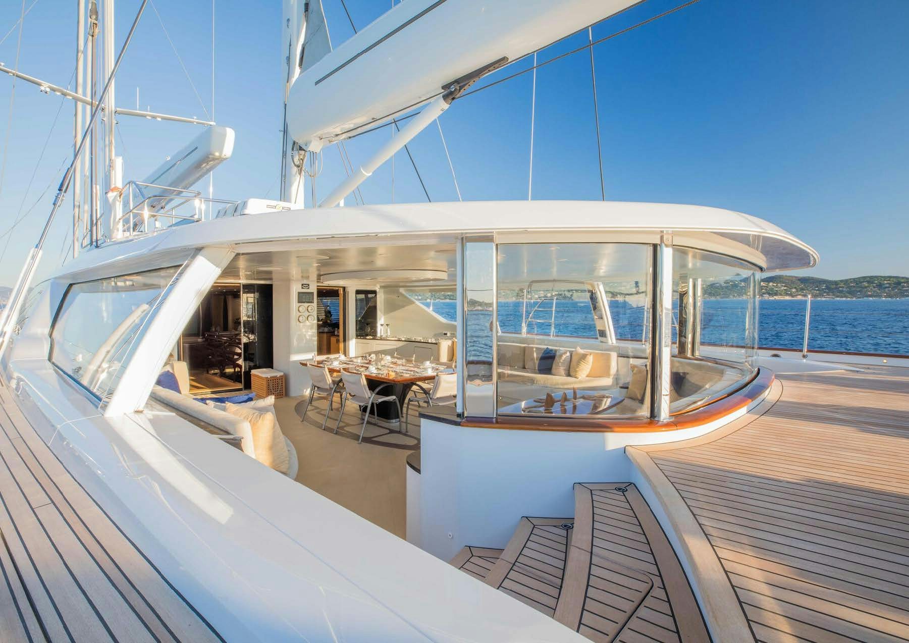 a large white boat on a deck aboard SALVAJE Yacht for Sale